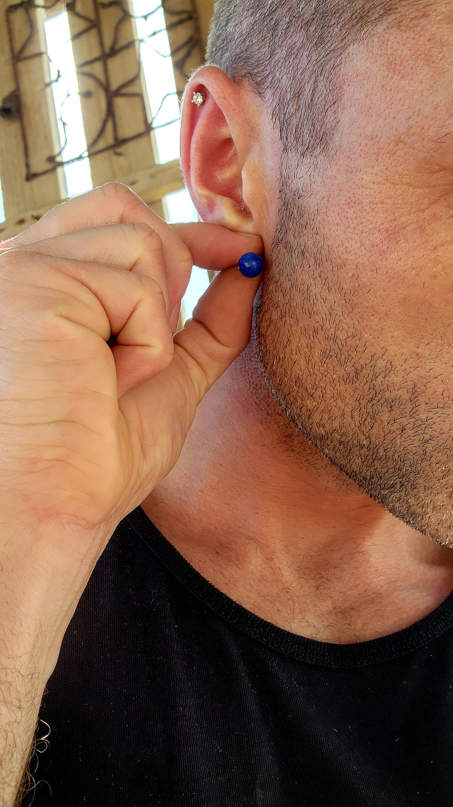 A charming vintage lot of two contrasting pairs of push-in stud earrings, each crafted in silvertone metal and each telling its own beautifully distinct story.
