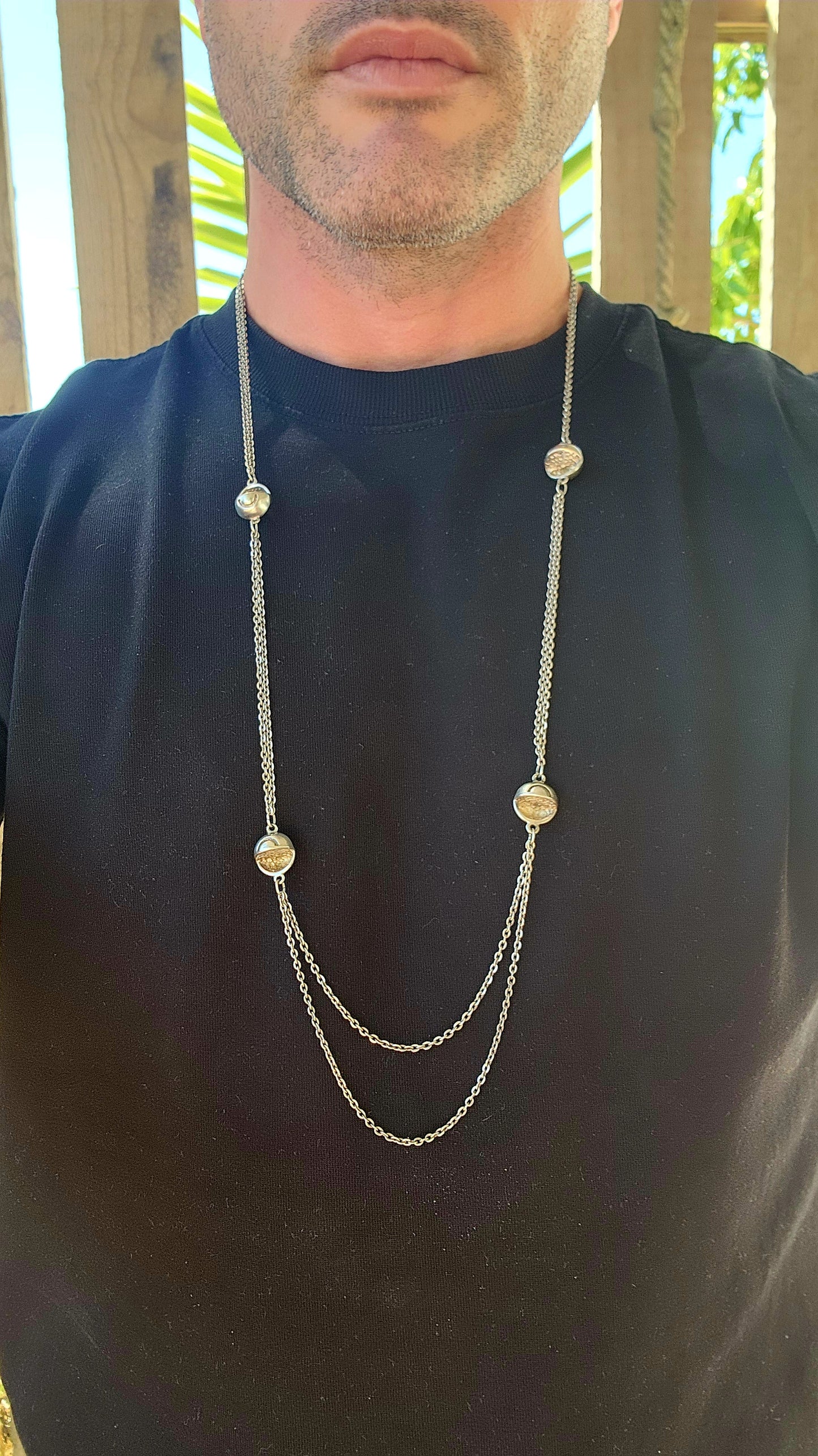 Up for grabs is an artisan-made, extra-length sterling silver modernist necklace that feels like it’s travelled straight through a wormhole from a futuristic design studio somewhere between 1960s Space Age optimism and outer-galactic couture.