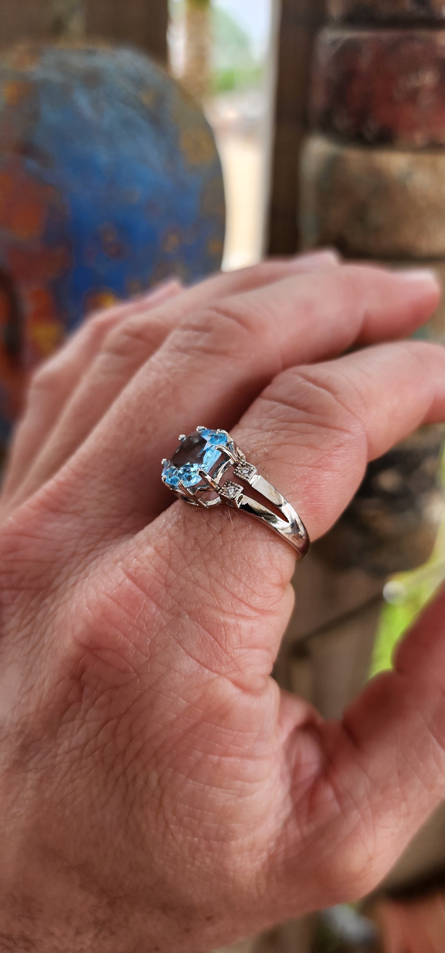 A remarkably beautiful trilogy-style dress ring crafted in gleaming sterling silver, dripping in Deco-revival glamour with a bold, confident presence on the hand.