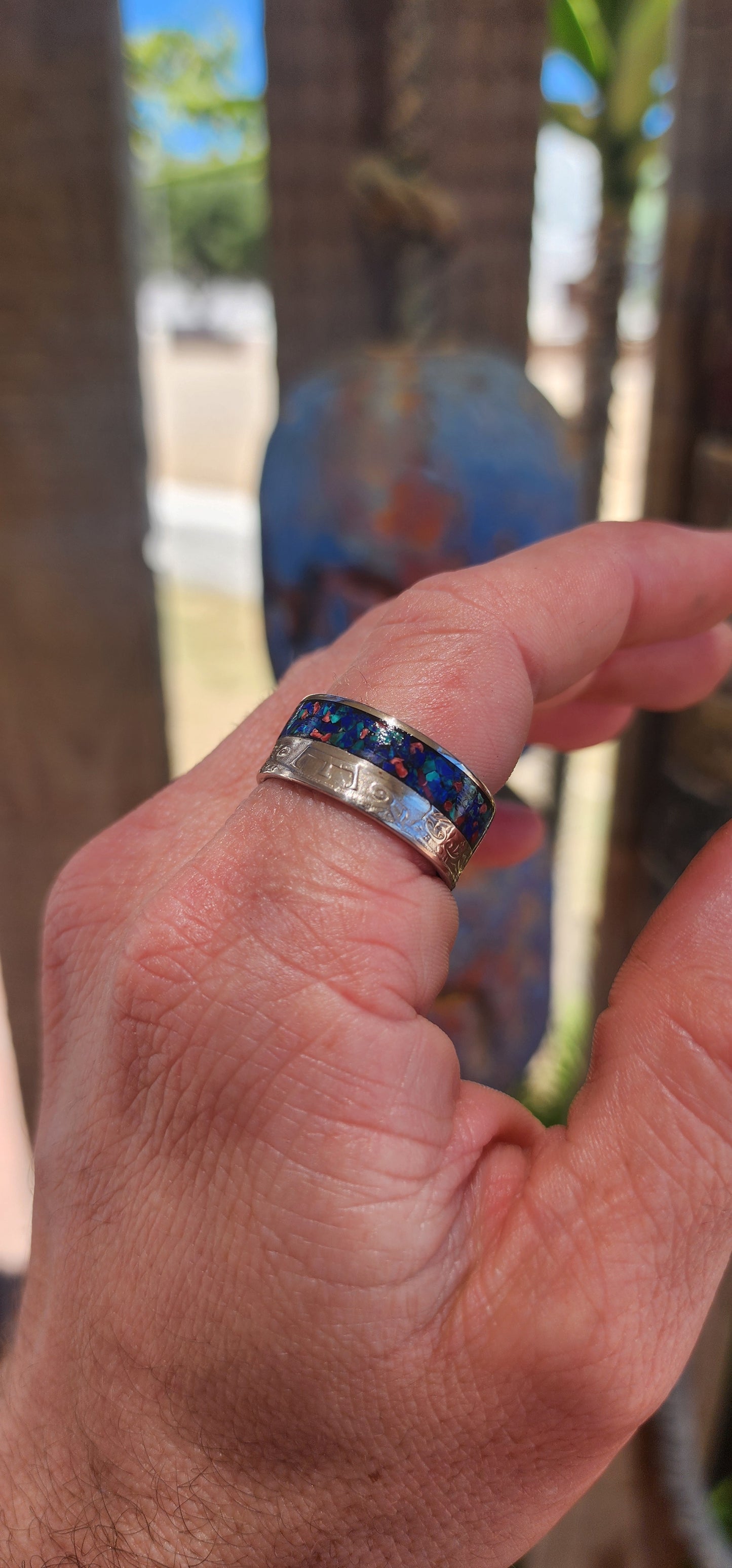 An artisan-made, one-of-a-kind statement ring crafted from an authentic Queen Elizabeth II Half Crown nickel coin — turning historical currency into rugged, wearable art.