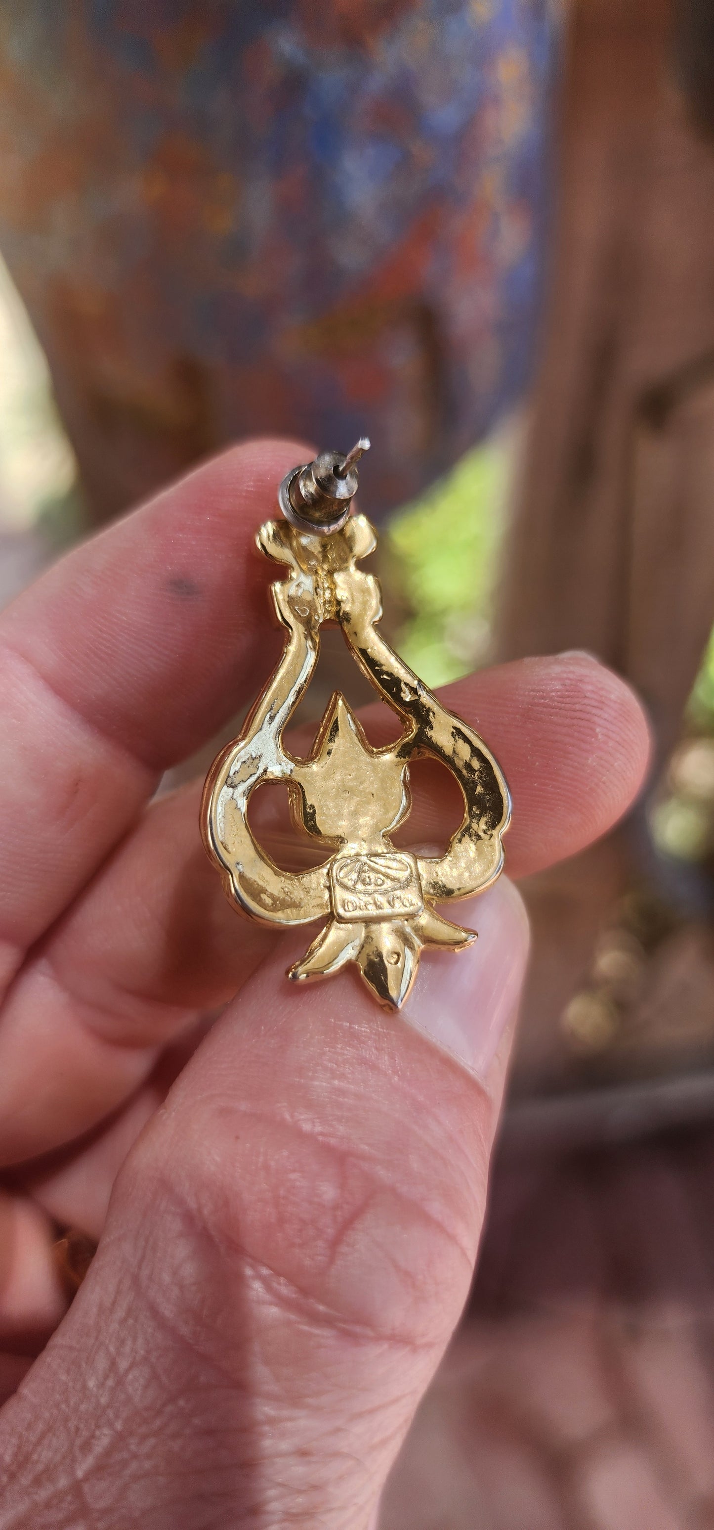 A beautiful pair of vintage costume designer earrings by Dick & Co., known for producing elegant, high-quality costume jewellery pieces with a strong focus on sparkle and m design.