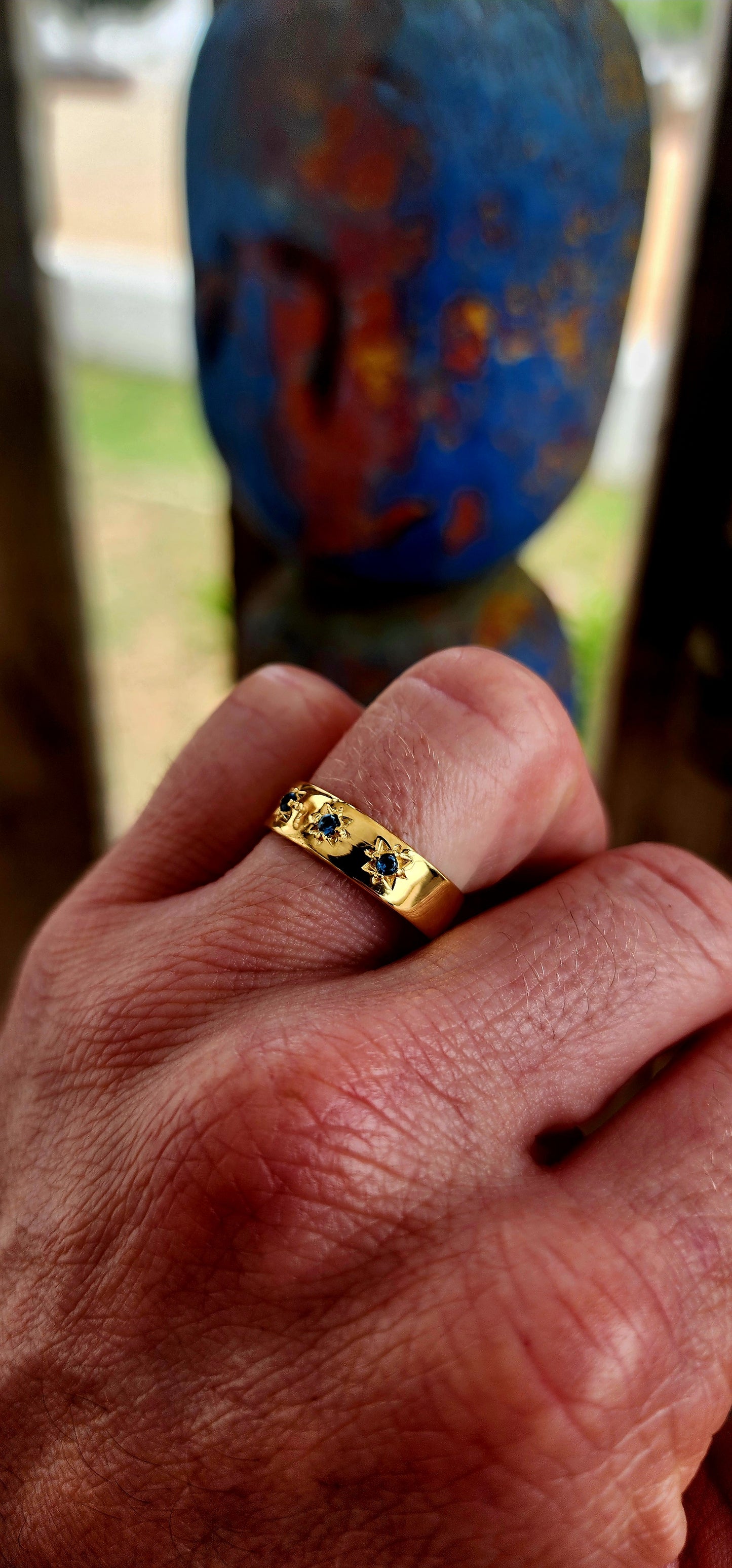 Crafted in solid sterling silver and luxuriously finished in rich 18ct yellow gold plating, this unisex gypsy-style band carries a presence that doesn’t ask for attention — it commands it.