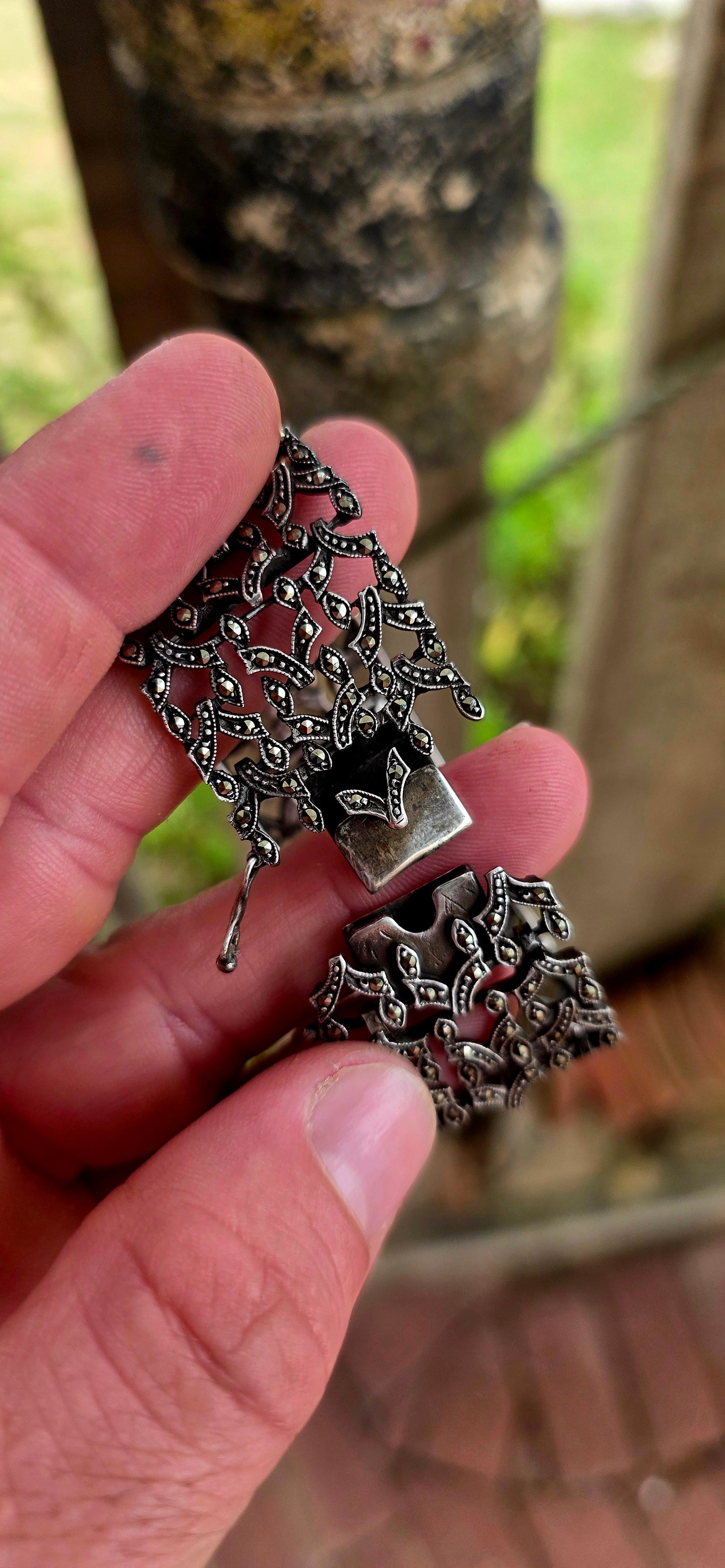 A marvellous and exceptionally beautiful antique bracelet dating to the glamorous Art Deco era, circa 1920’s, crafted in solid sterling silver and richly decorated with shimmering prong-set marcasites.