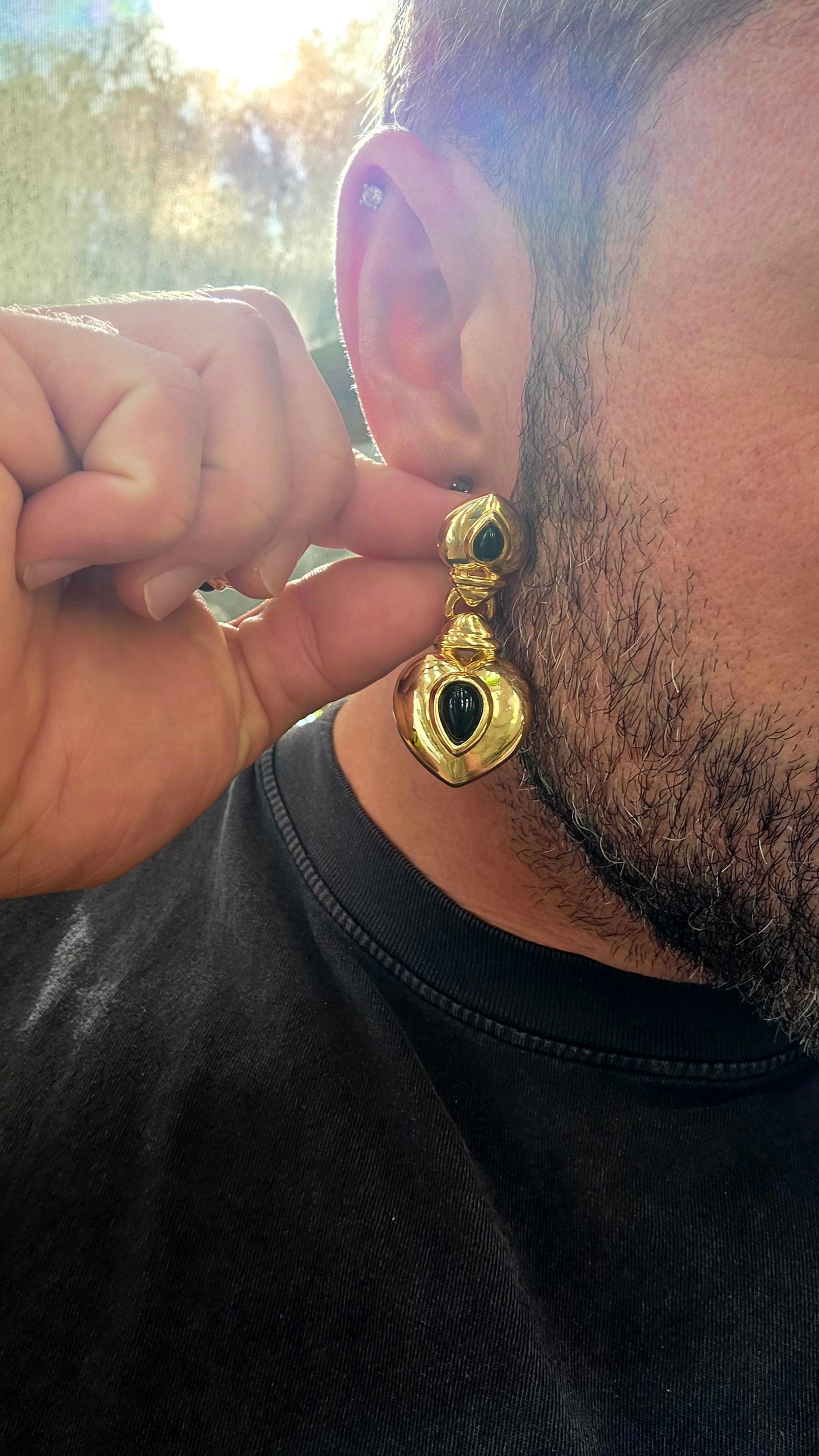This large and striking pair of vintage 1990’s clip-on earrings captures that unmistakable bold statement style that defined late-20th-century fashion jewellery.