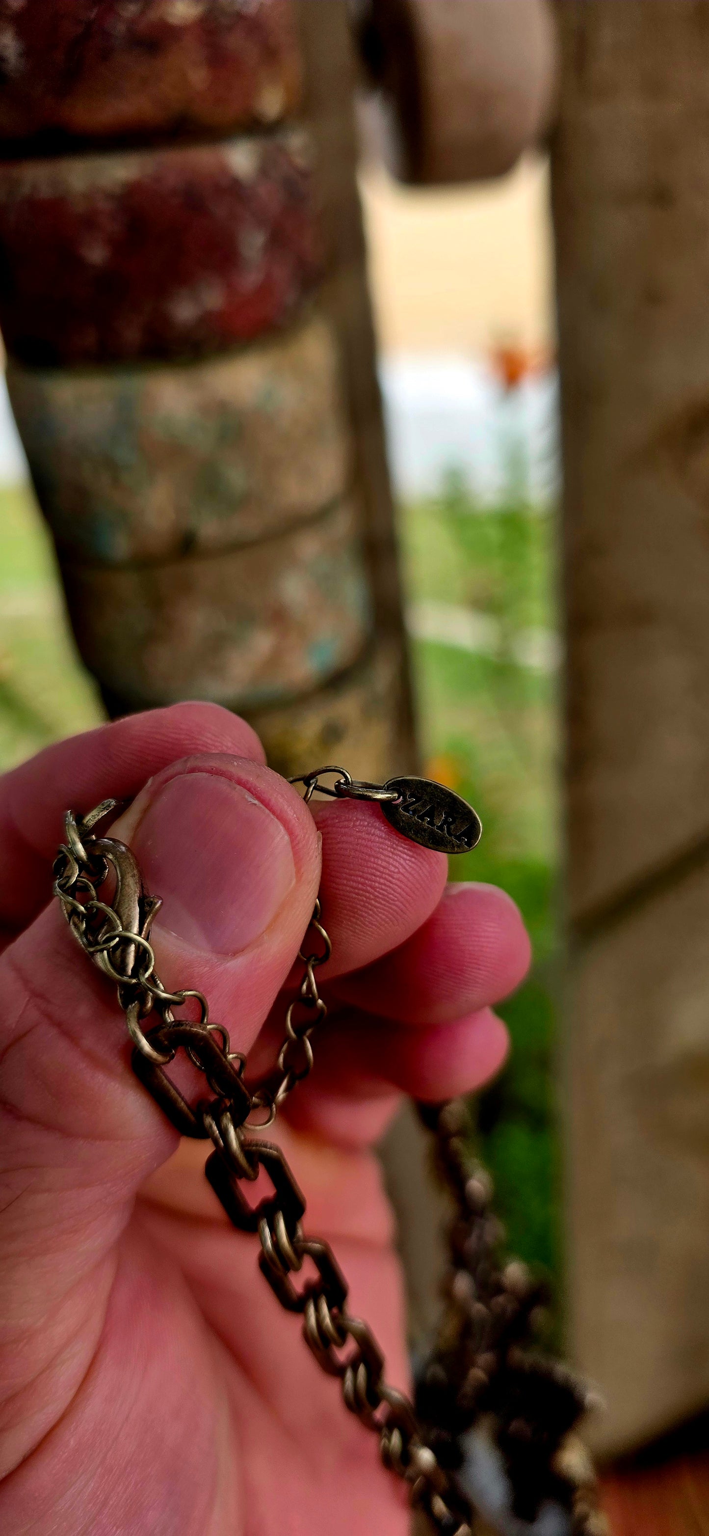 A chunky designer costume bib / waterfall necklace by Zara, from a now discontinued collection — making it that much more collectible.