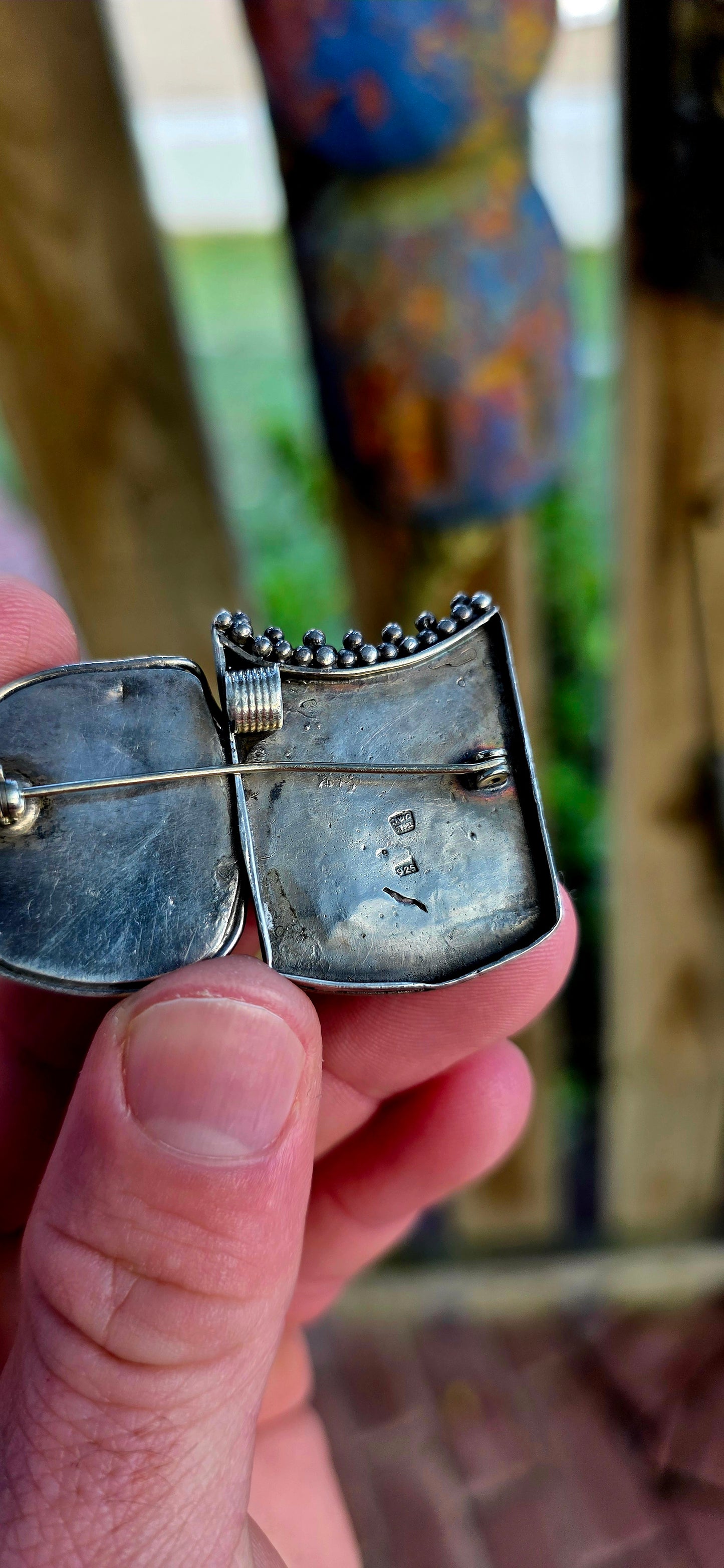A striking and chunky statement brooch handcrafted in solid silver, showcasing intricate filigree and granulation work — ancient techniques deeply rooted in the jewellery traditions of the Middle East and North Africa.