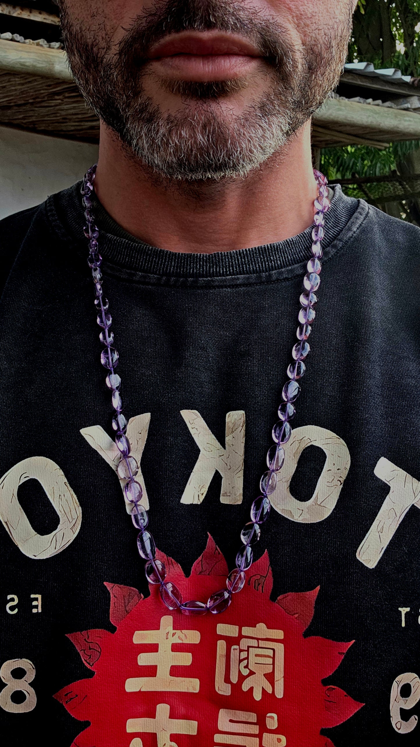A striking extra-long strand of natural amethyst gemstone beads, glowing in those irresistible lavender-to-violet hues that shift beautifully in the light.
