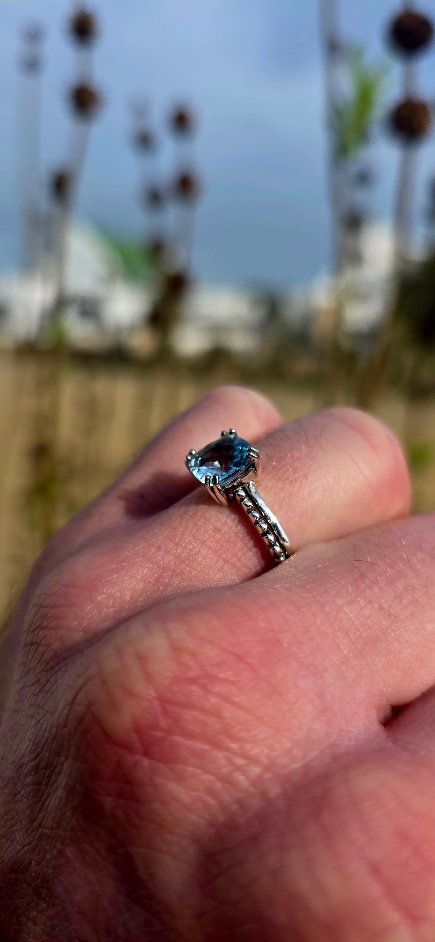 Delicate, elegant and wonderfully unique... this sterling silver solitaire ring offers a fresh take on a timeless classic .