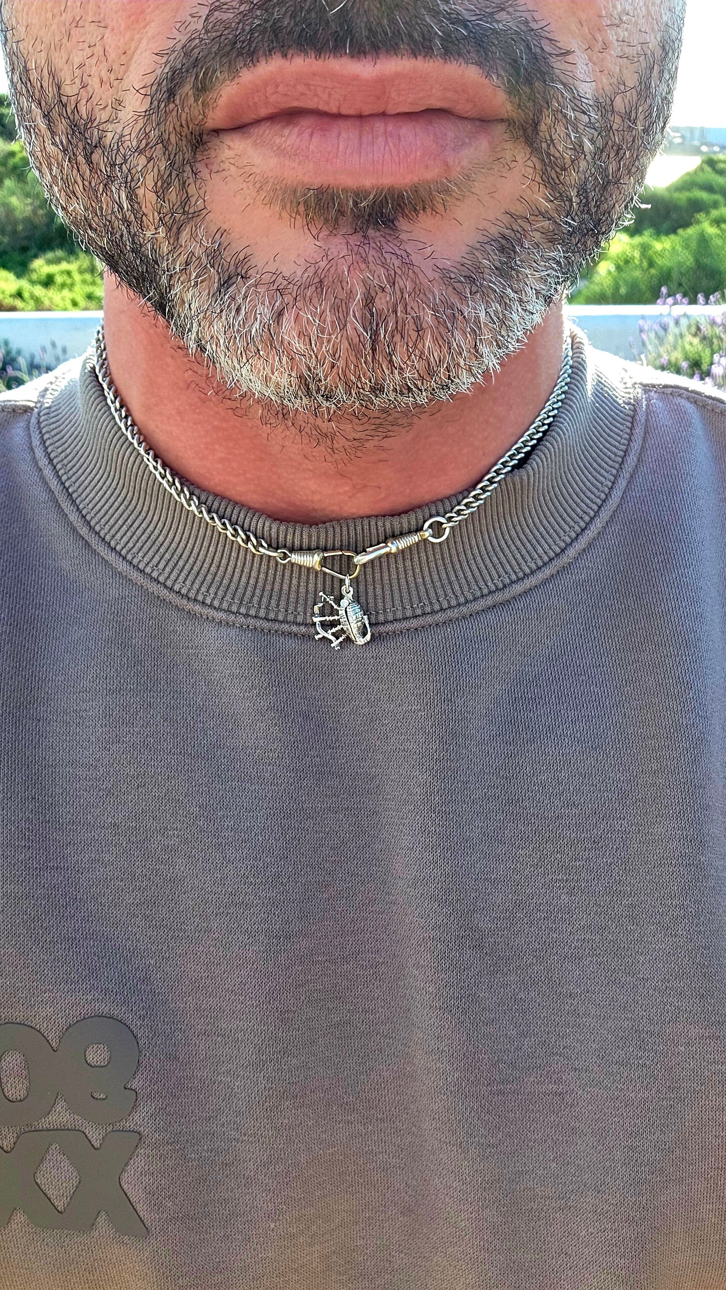 Up for grabs is a wonderfully unusual vintage sterling silver articulated charm in the shape of a traditional Scottish bagpipe.