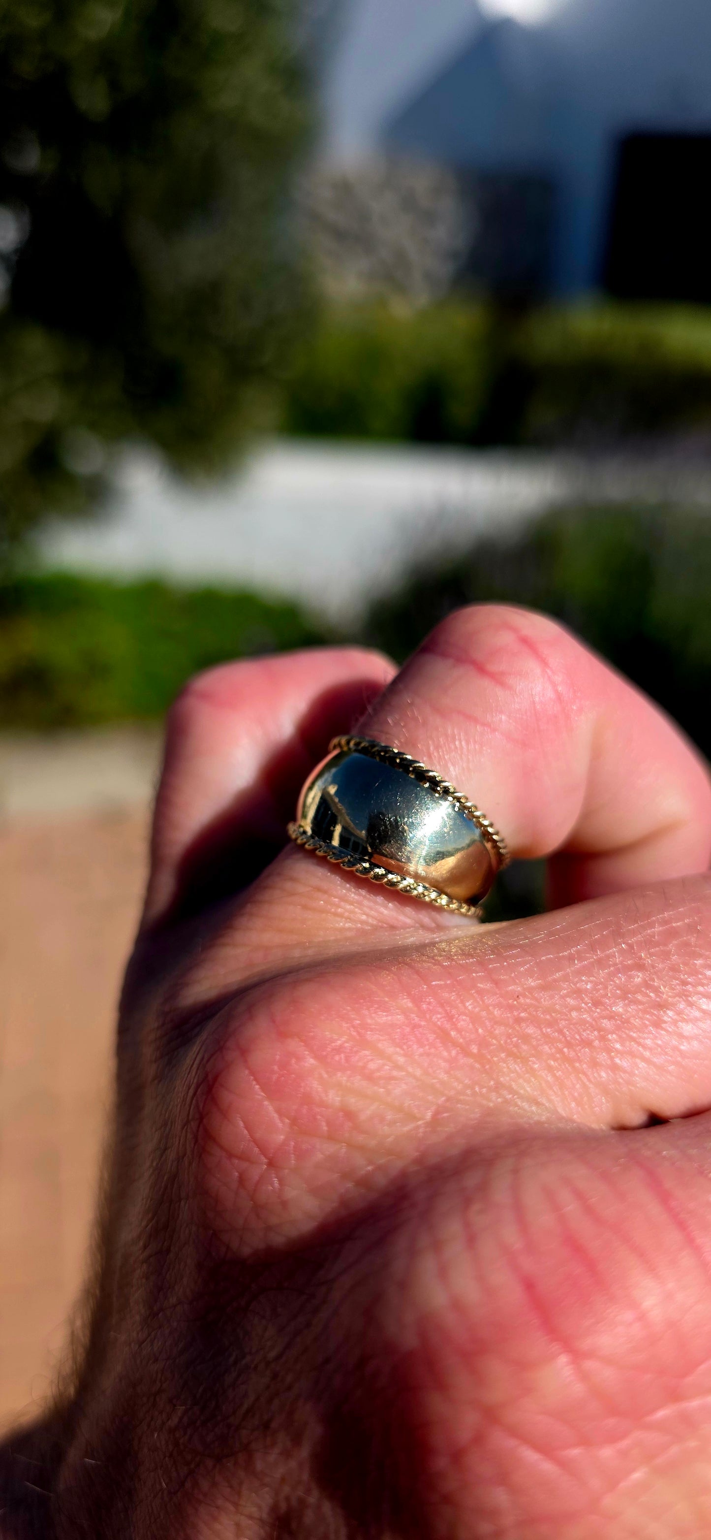 There is something undeniably sophisticated about a beautifully crafted gold band... and this solid 9ct yellow gold statement ring is the perfect example.