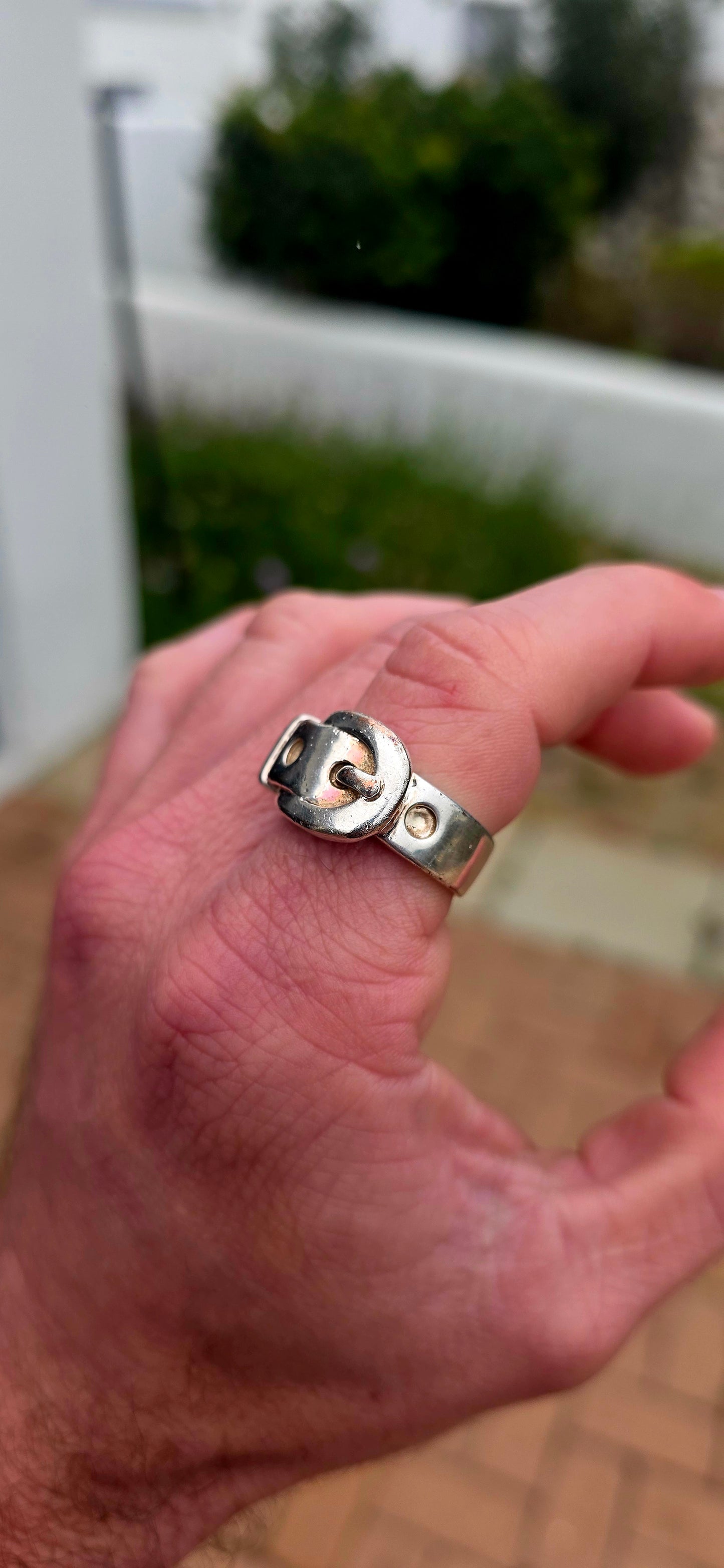 Such a fabulous chunky one! A vintage unisex costume ring, crafted in silver-plated metal and designed as a wonderfully bold Victorian Revival belt & buckle ring.