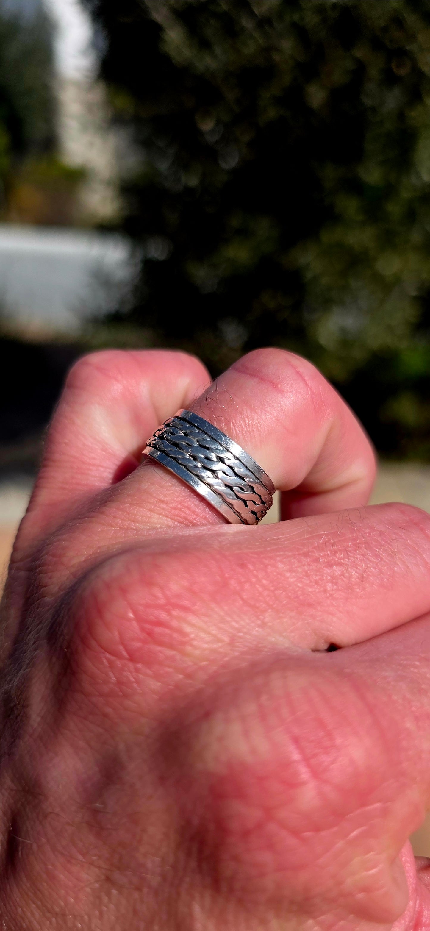 Fabulously tactile, chunky and beautifully UNISEX! This artisan-made spinner ring is crafted entirely in solid sterling silver, combining a substantial polished outer band with a wonderfully textured moving centre.