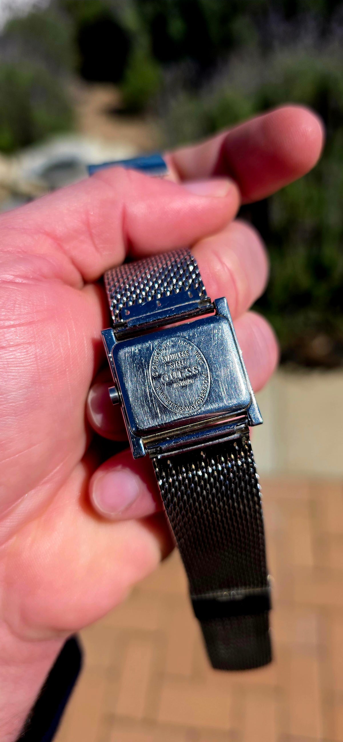 Oh this is wonderfully RETRO! A vintage ladies GUESS Mod-Mesh quartz wristwatch, combining a sleek rectangular case with a fabulous wide silver-tone woven mesh bracelet — giving it that unmistakable minimalist designer look.