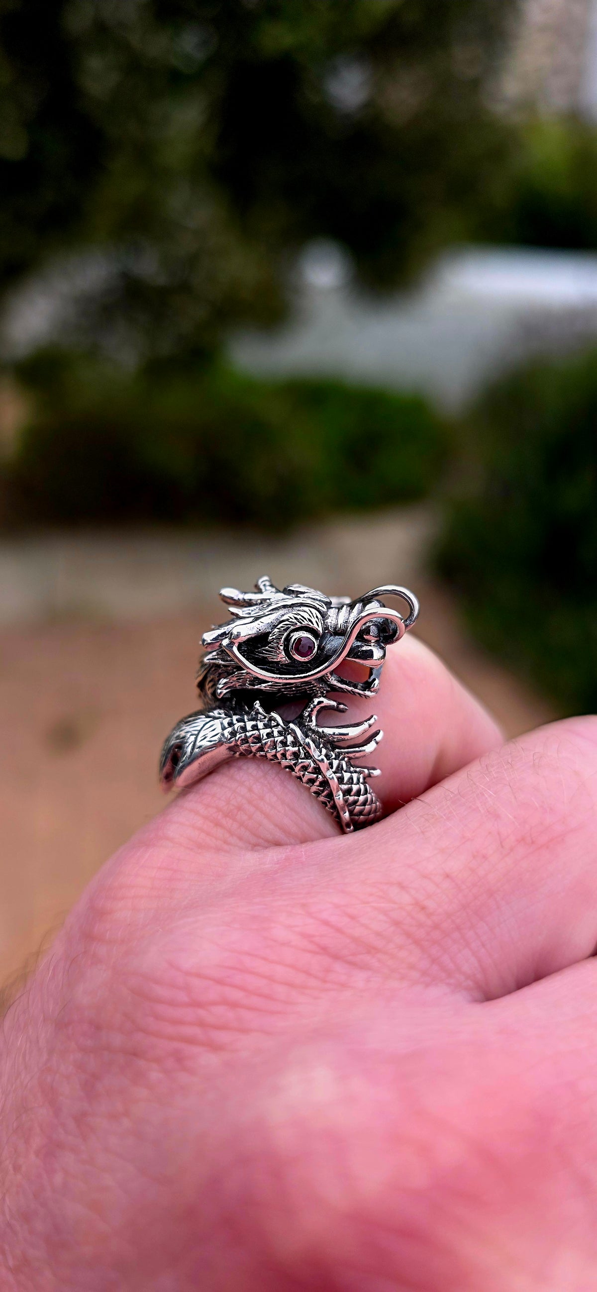 A seriously fabulous unisex chunky statement pinky ring, crafted in Sterling Silver as a magnificent three-dimensional Oriental dragon coiling dramatically around the finger.