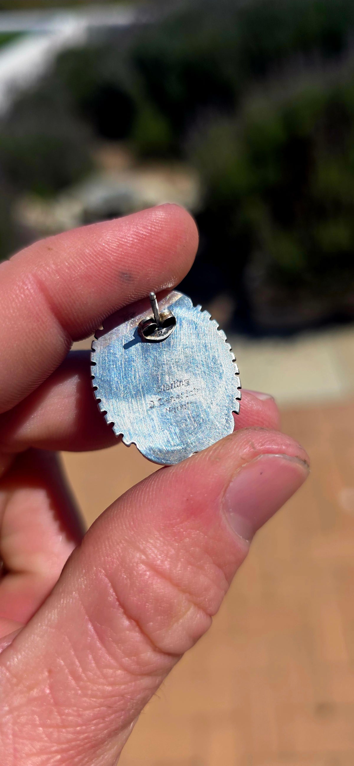 Generously sized pair of vintage Navajo sterling silver and turquoise earrings, handmade and signed by sought-after Navajo silversmith Will Denetdale.