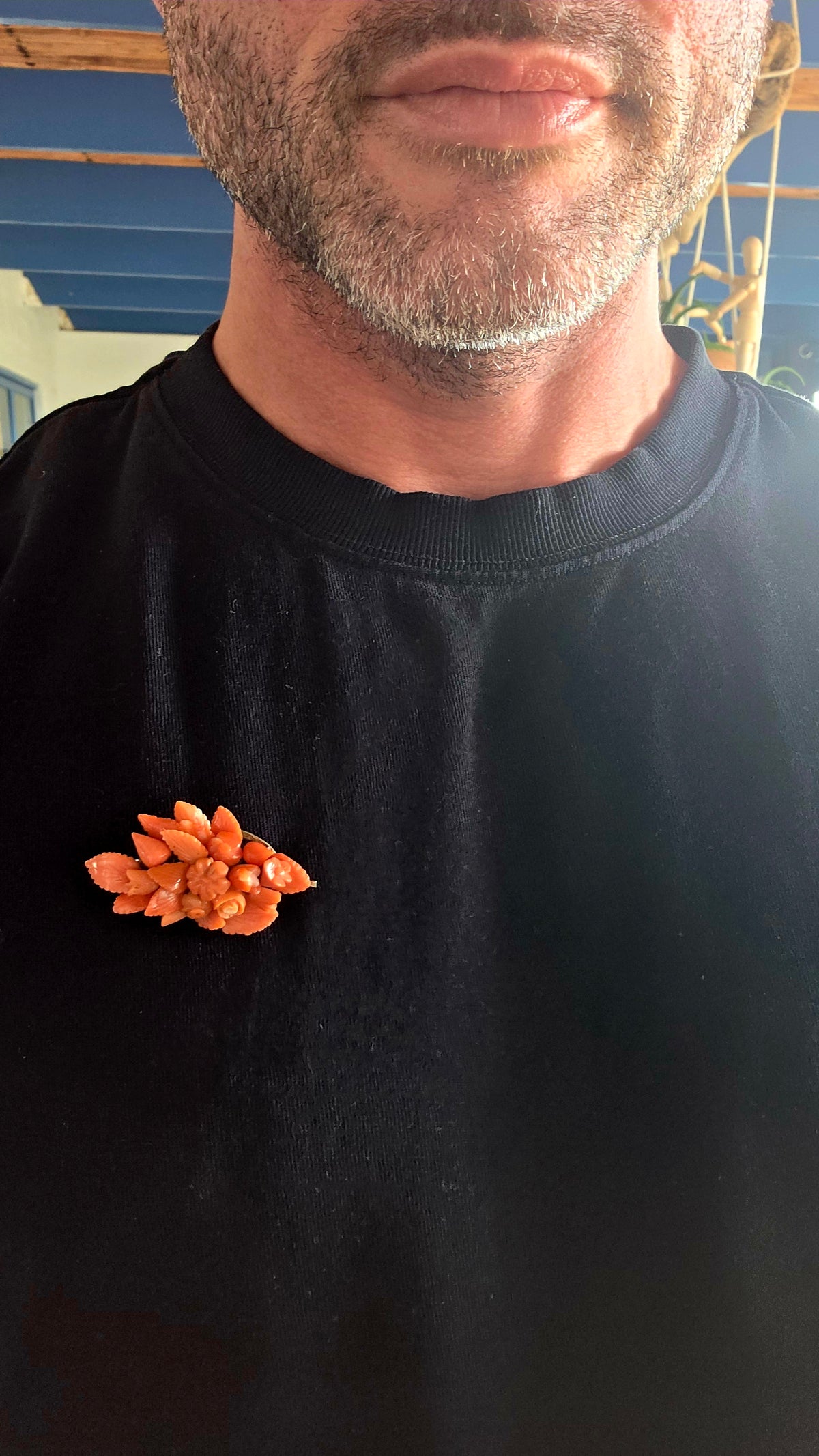 A magnificent antique Victorian-era sterling silver and hand-carved coral bouquet brooch, featuring the most delightful three-dimensional arrangement of miniature flowers, rosebuds and beautifully detailed leaves!