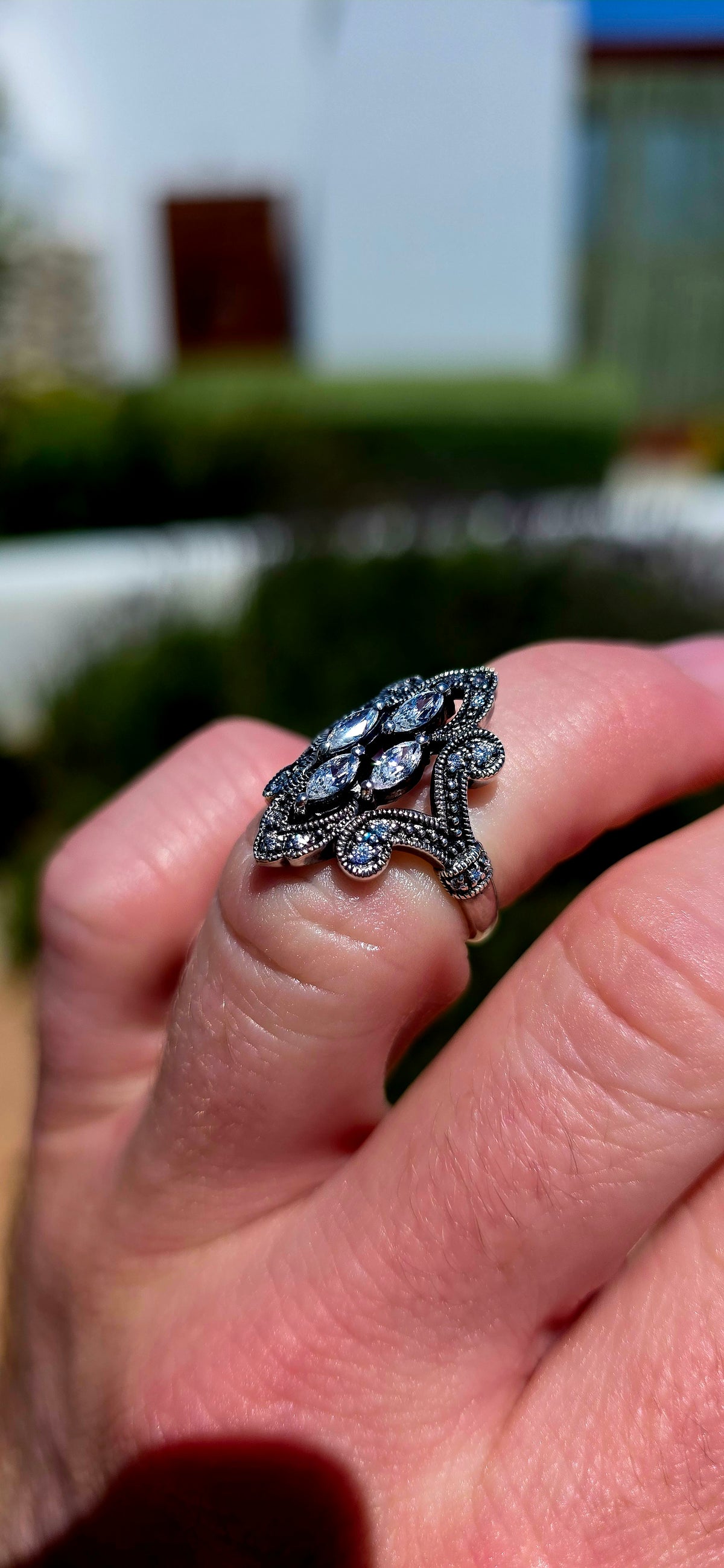 A beautifully ornate vintage-inspired sterling silver dress ring, bursting with old-world elegance and the most magnificent sparkle!