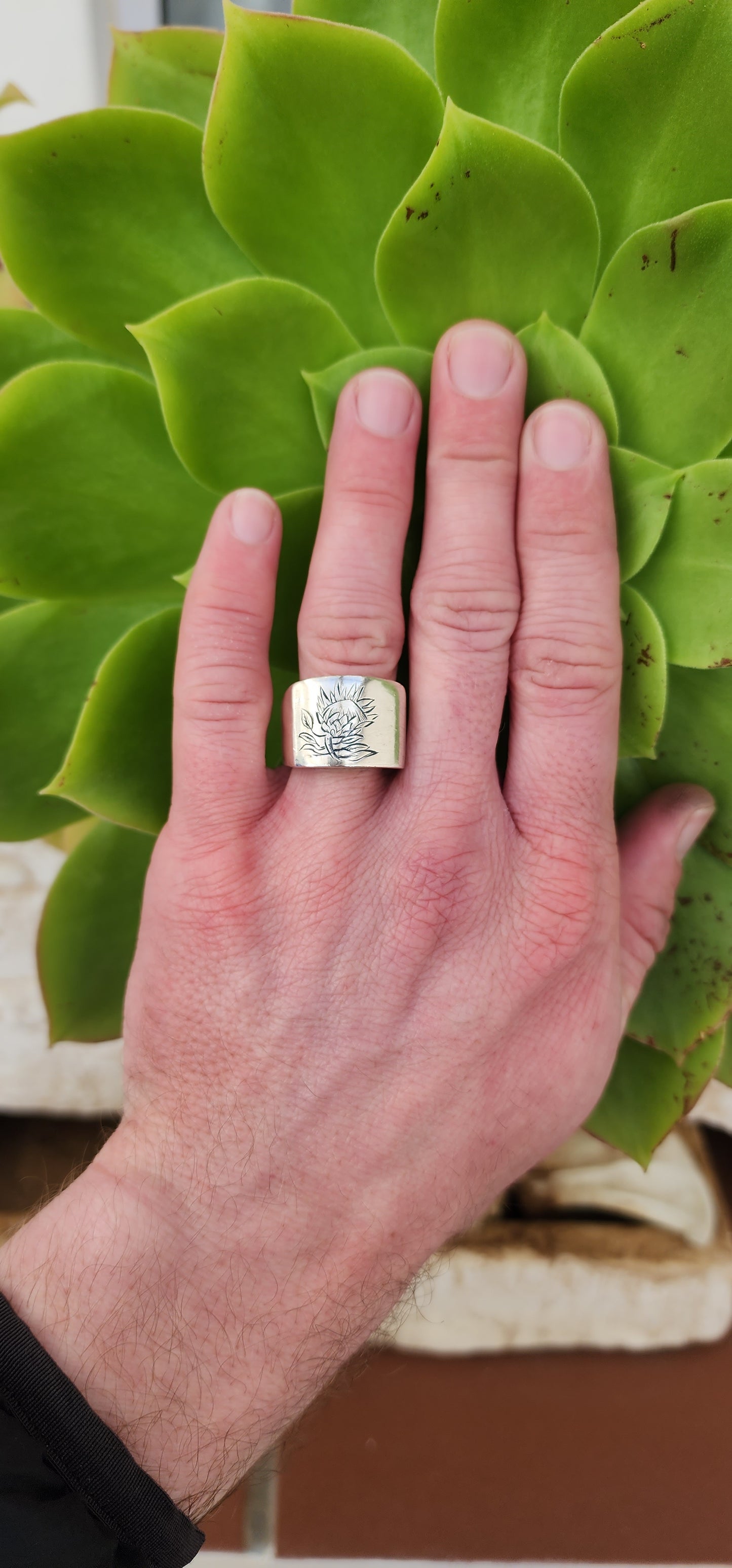 Chunky  Hadmade Sterling Silver ring with hand engraved Protea Flower.