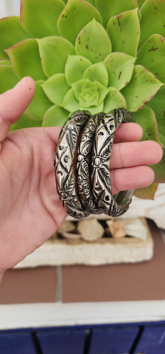 Antique set of 3 chunky and ornately embossed Silver Plated Chinese wedding/rattle bangles.