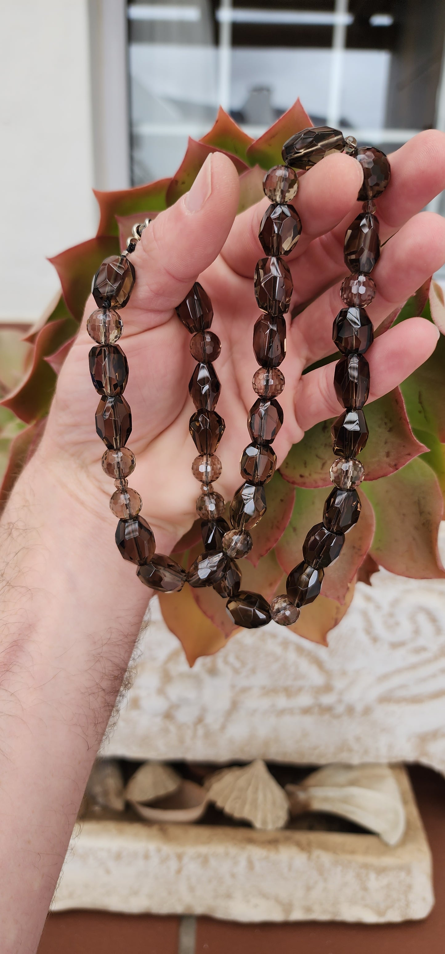 Natural Smokey Quartz Gemstone beaded necklace - All the beads are faceted cut - Fitted with an Signoretti clasp.