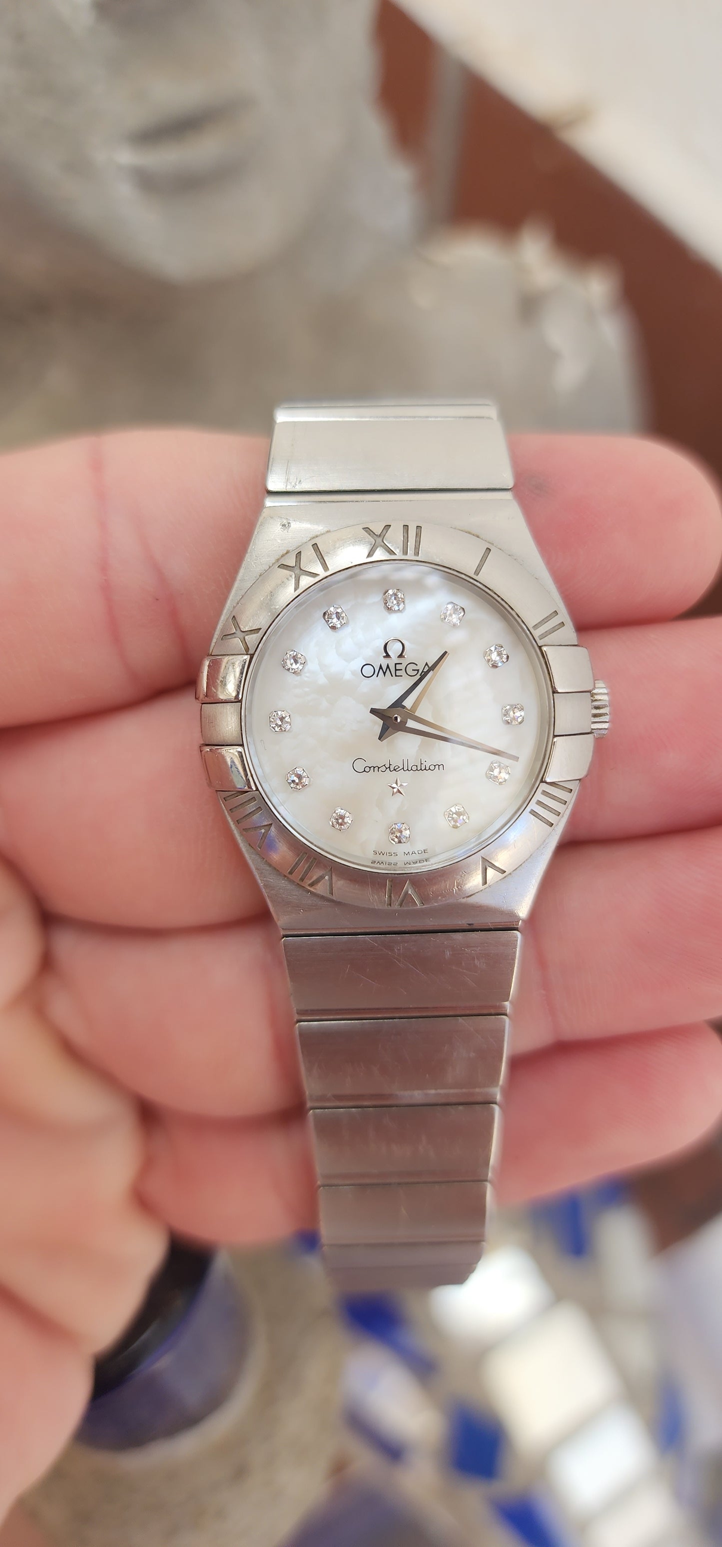 Ladies Omega Constellation wrist watch with box and papers.