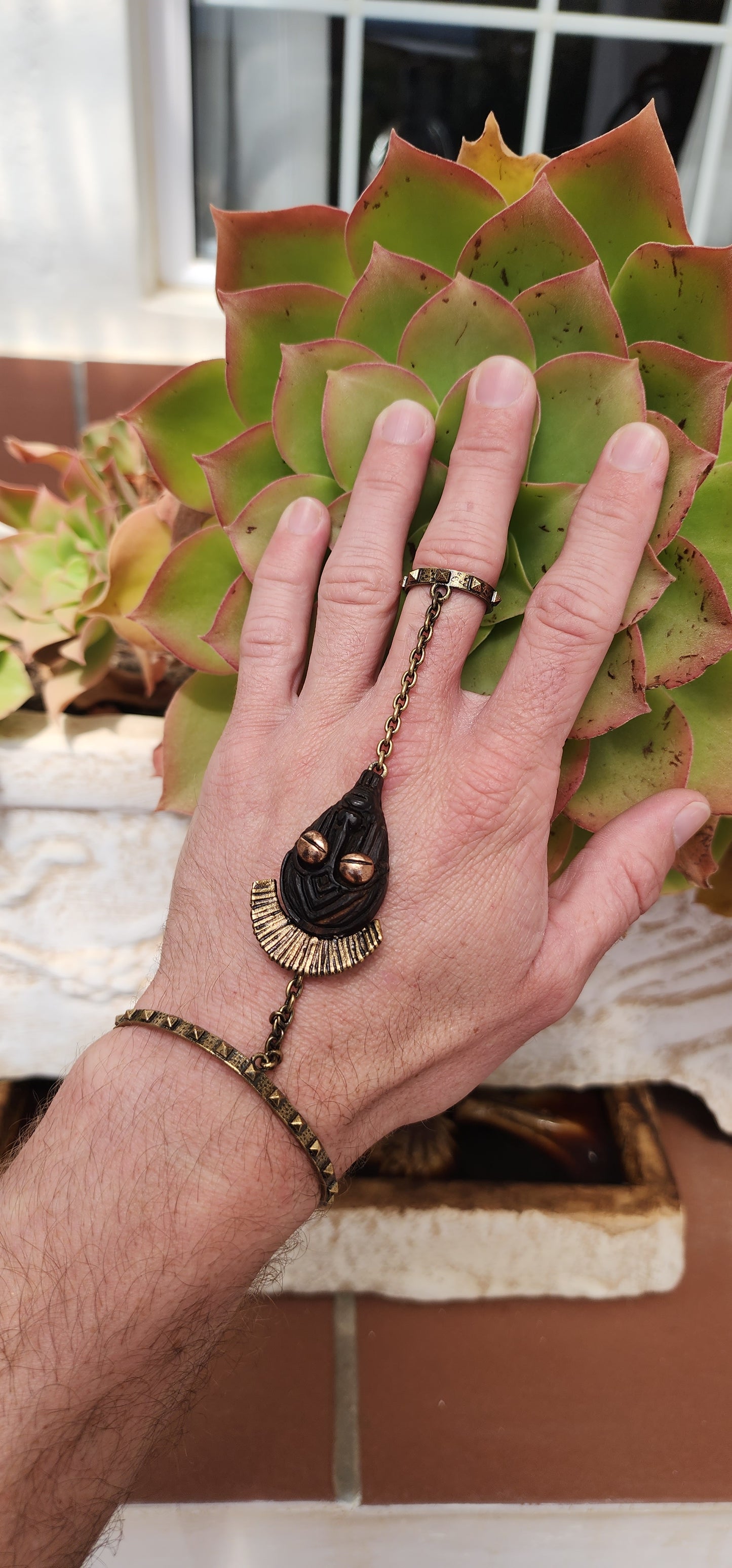 Designer Costume Bronze/Wood Garavani Mask linked ring bracelet by the incredible Maison Valentino.