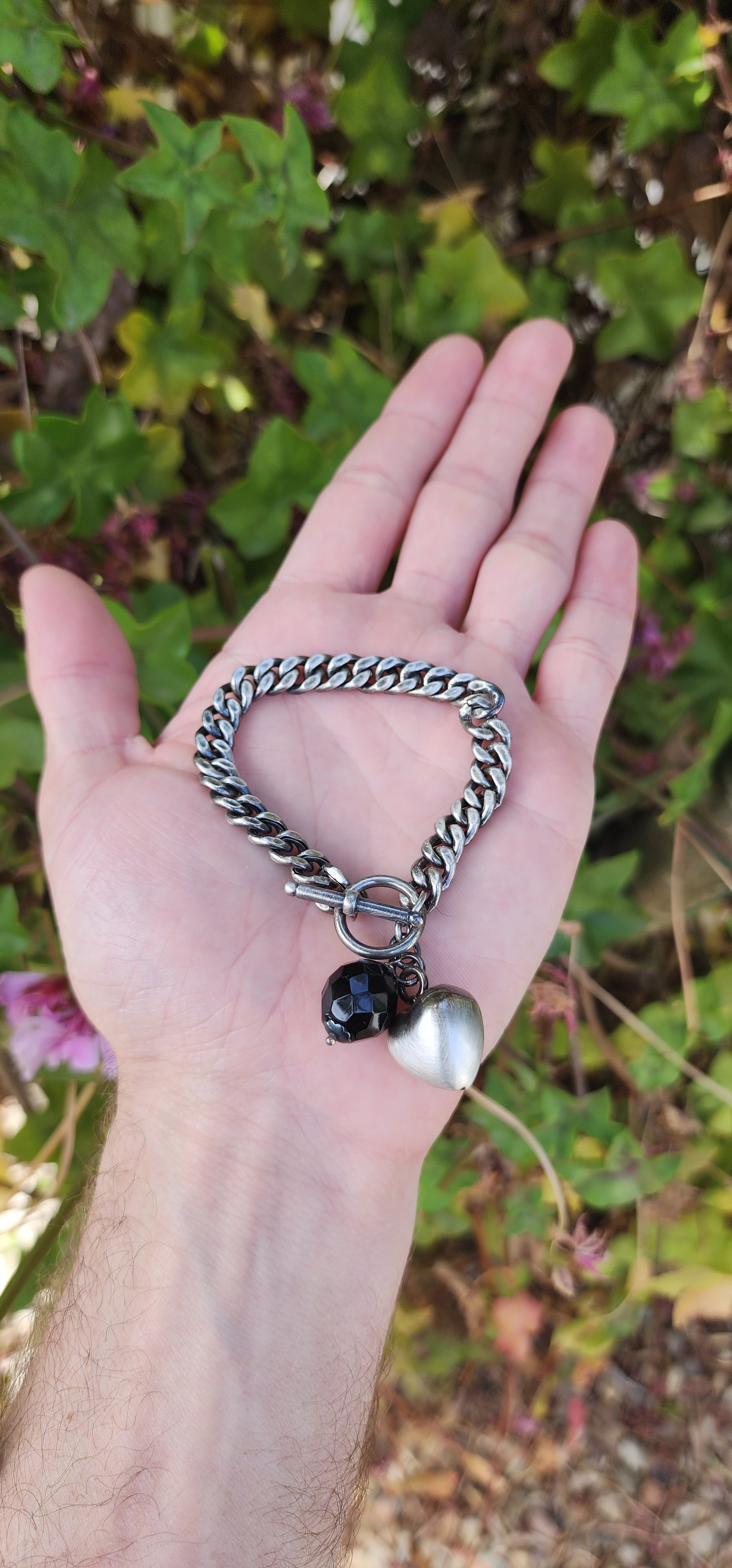 Vintage style Oxidised Sterling Silver Cuban link bracelet with puffed Heart and Faceted Black Onyx Gemstone charms - Fitted with an Toggle clasp.