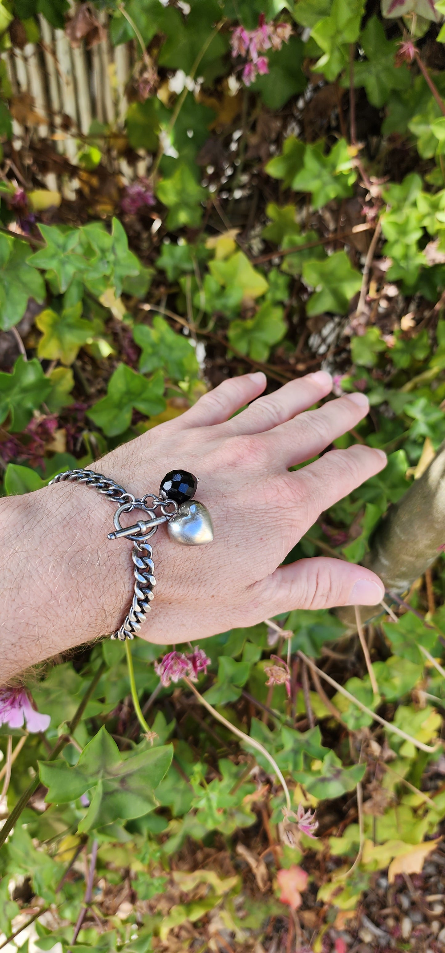 Vintage style Oxidised Sterling Silver Cuban link bracelet with puffed Heart and Faceted Black Onyx Gemstone charms - Fitted with an Toggle clasp.