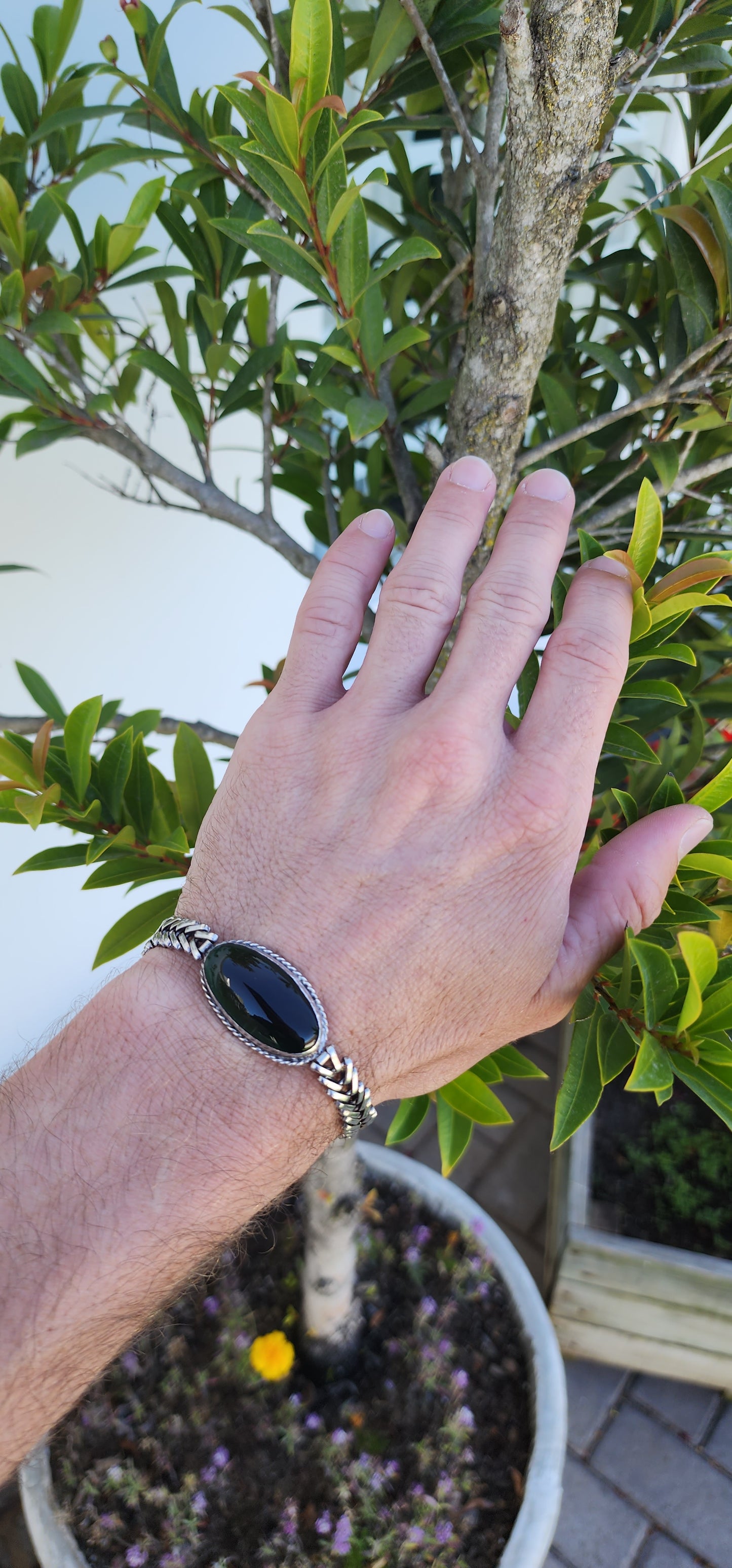 Sterling Silver Chevron style link bracelet set with an beautiful dark Greenish/Brown Serpentine Cabochon.