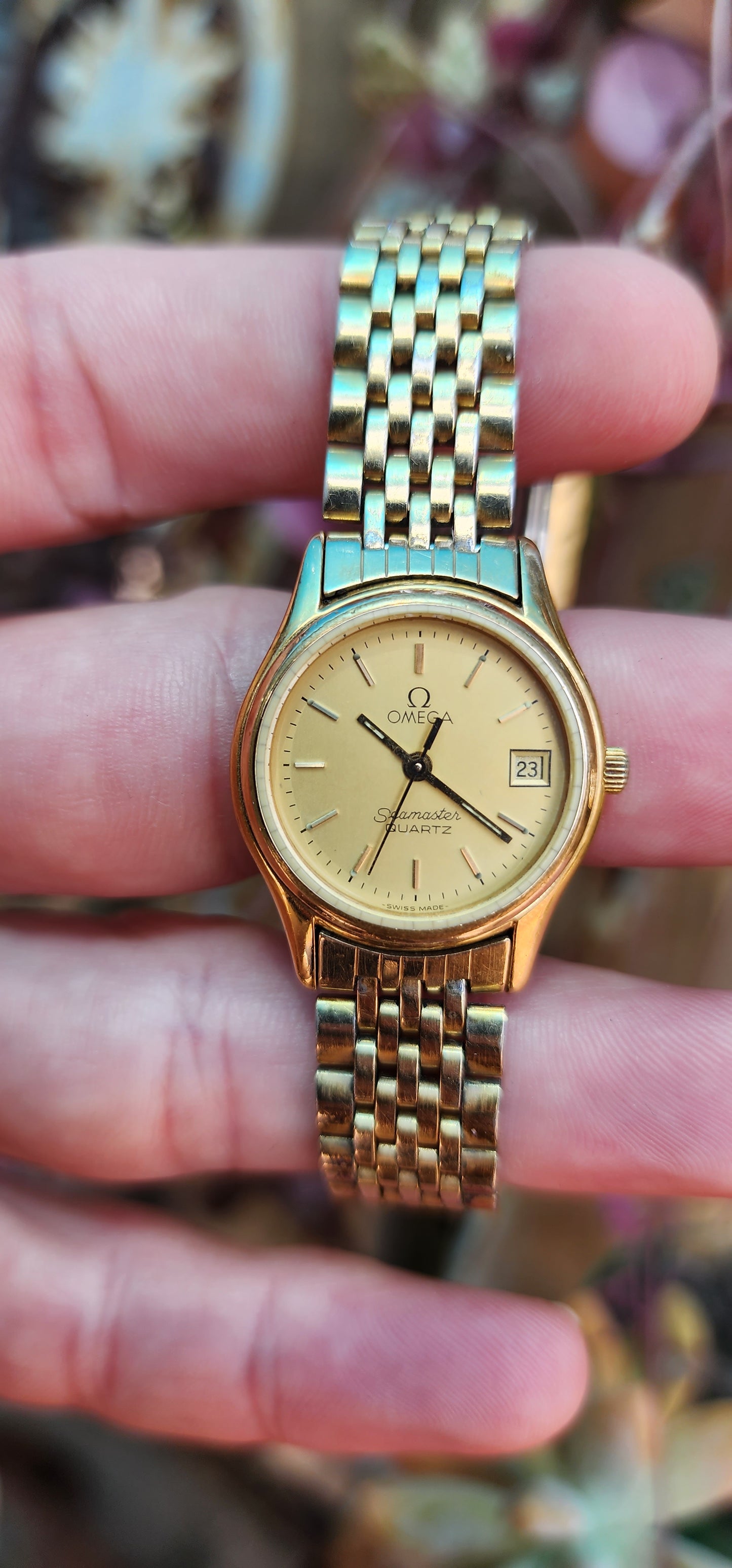 Vintage circa 1983 ladies Yellow Gold plated Omega Seamaster Quartz watch with original Gold Plated strap.