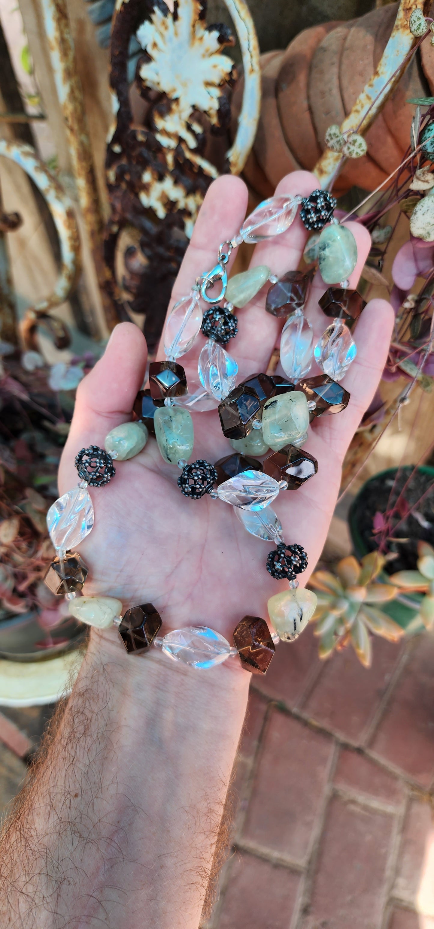 Chunky necklace consisting out of Clear Quartz , Smokey Quartz and Prehnite Gemstone beads and added Sterling Silver Bali accent beads