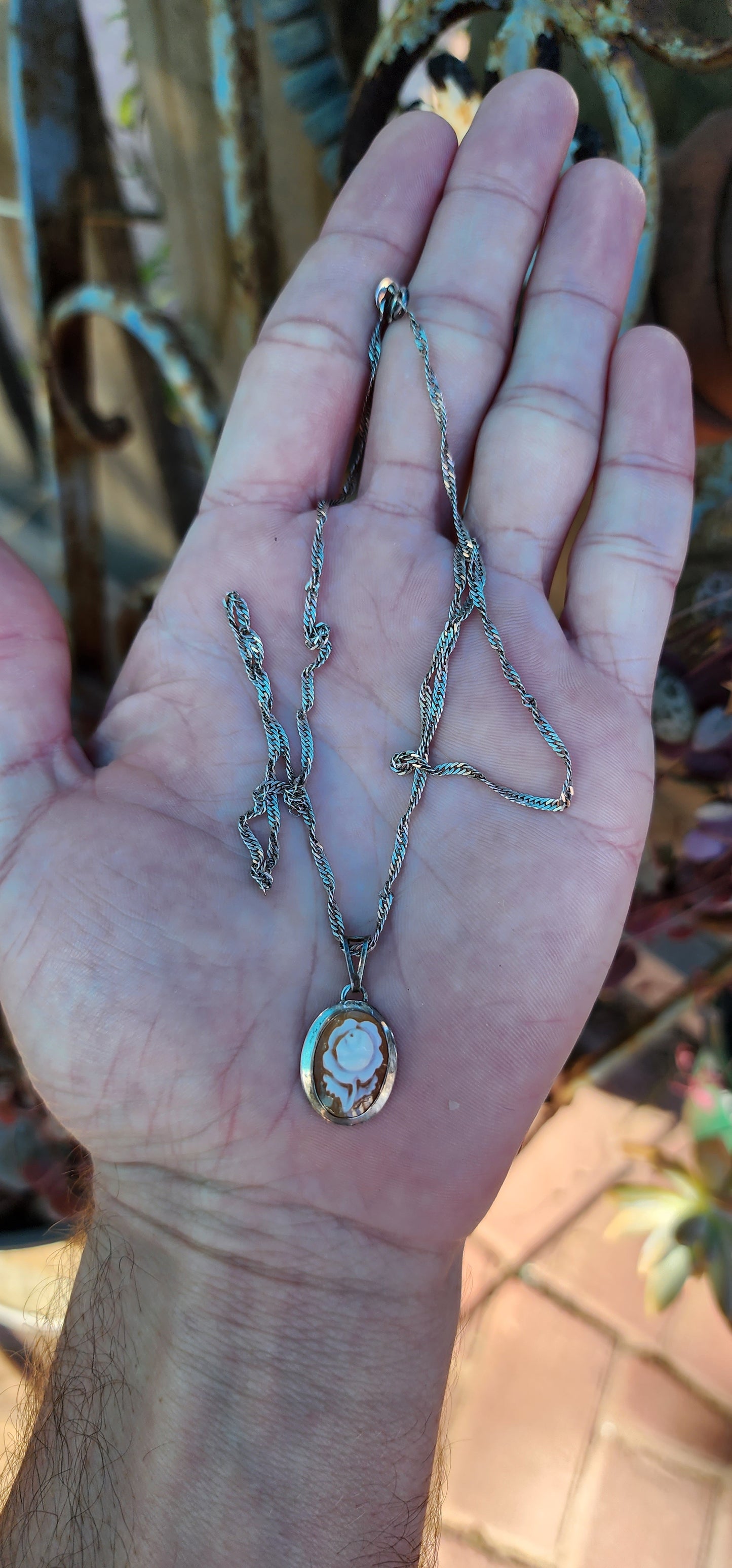 Vintage Sterling Silver and hand carved Rose Cameo Shell pendant - Fitted on an Sterling Silver chain .