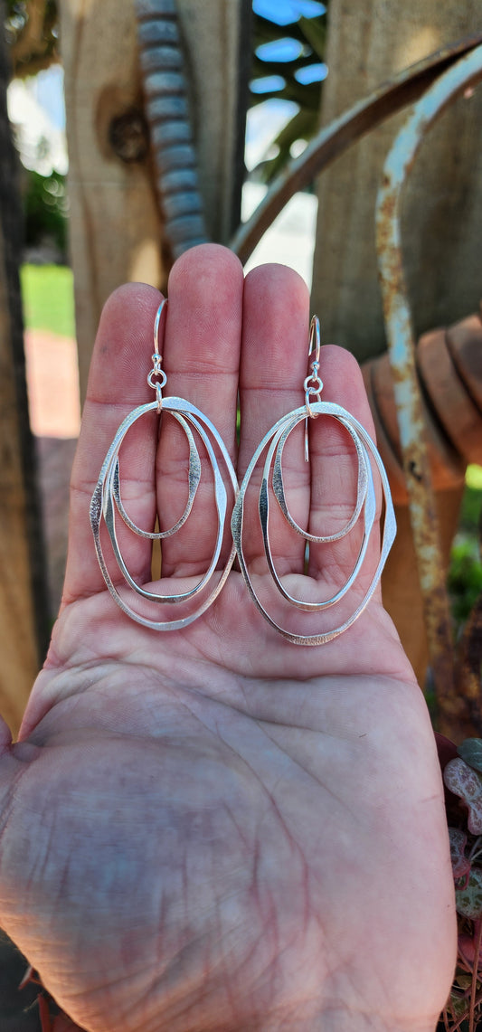 Fabulous and large pair of Sterling Silver Oval/Geometric shapes chandelier drop earrings.