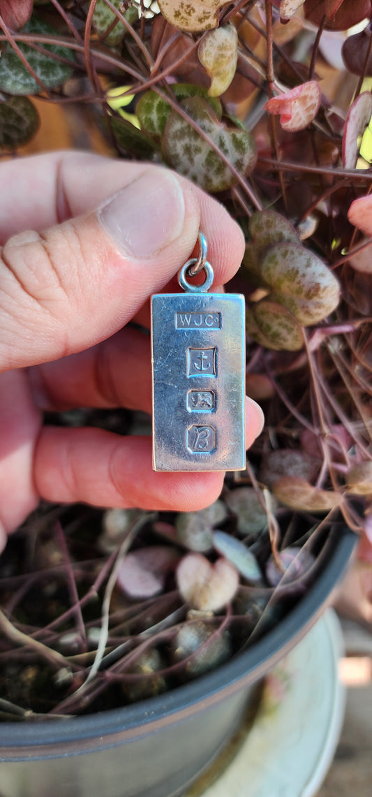 Weighty and solid Hallmarked Silver Ingot pendant.The Ingot pendant made in Birmingham Circa 1976 and Hallmarked accordingly.