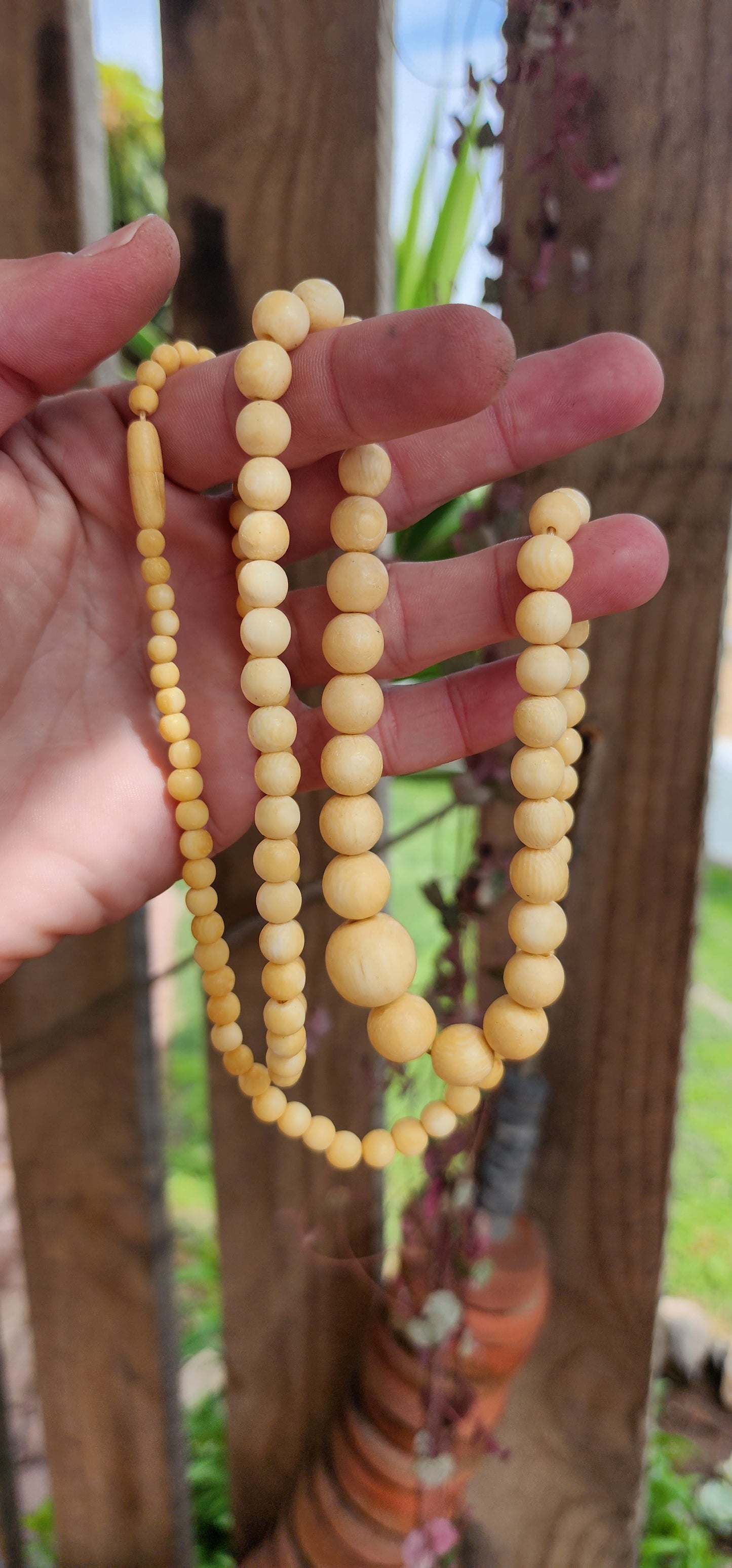 Marvelous Antique extra length pre-ban Ivory beaded necklace .