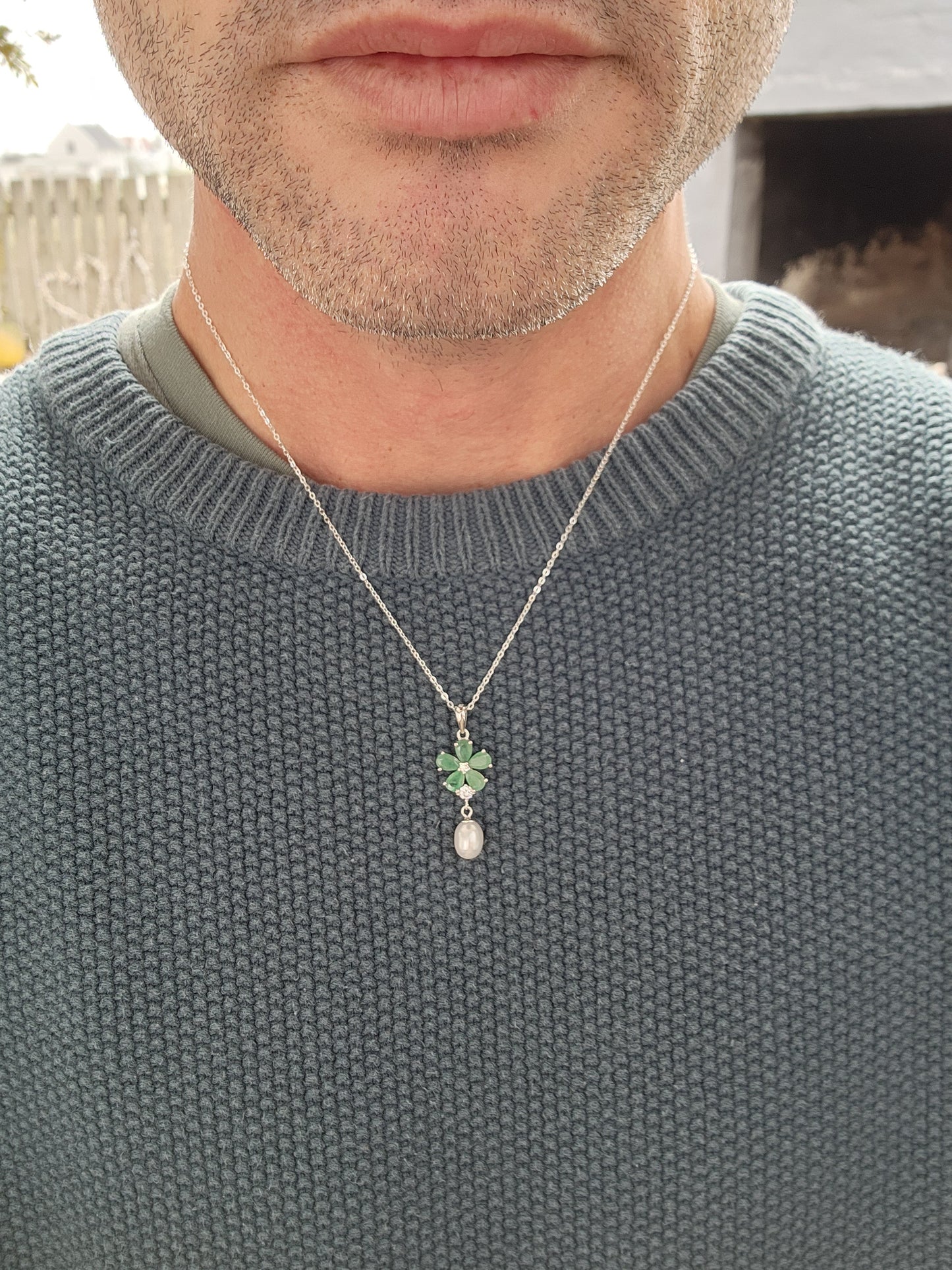 Attractive Sterling Silver ,Natural Emeralds,clear CZ Gemstones and Freshwater Pearl pendant on Sterling Silver chain.