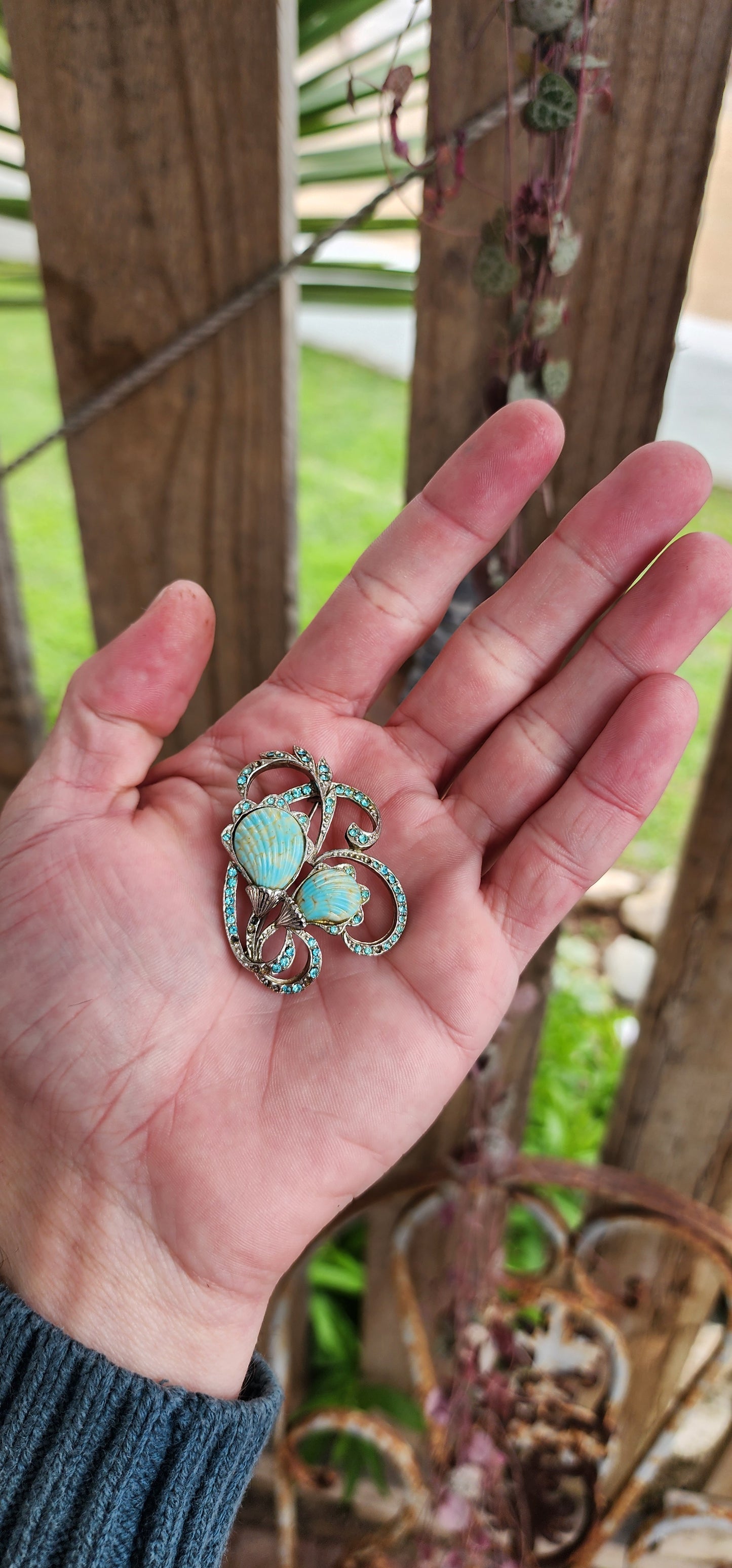 Vintage Designer Costume matching brooch and clip-on earrings set from the 1960's.Lovely Blue Glass Sea Shells and Blue Rhinestones.