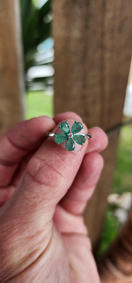 Attractive Sterling Silver ,Natural Emeralds and clear CZ Floral dress ring.