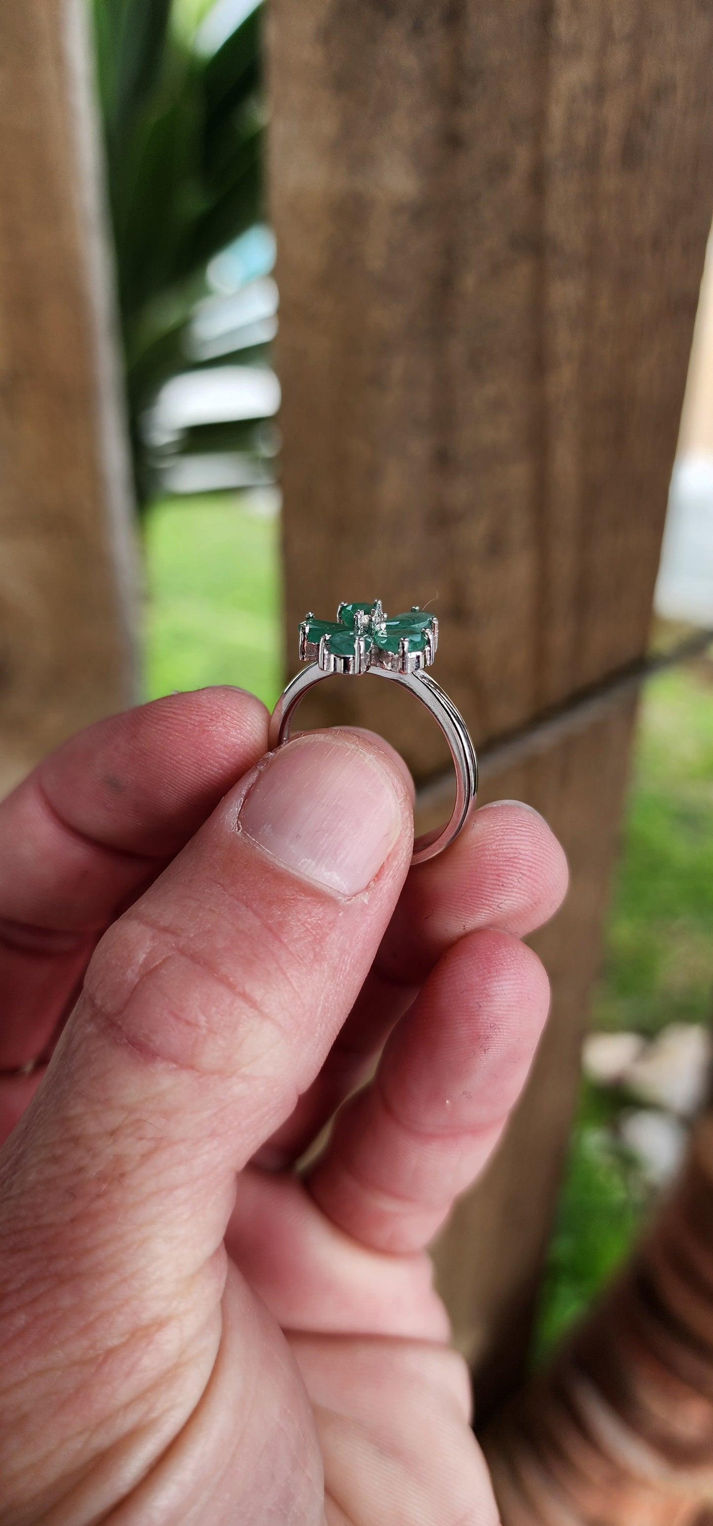 Attractive Sterling Silver ,Natural Emeralds and clear CZ Floral dress ring.