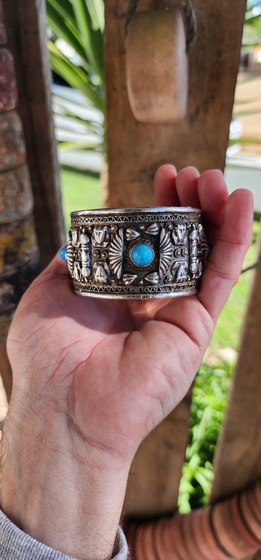 Vintage and chunky/wide 800 Silver Egyptian Revival open cuff bangle - Ornately decorated with embossed Pharaoh (Tutankhamun) head motifs,Etruscan style wire/bead work and bezel/tube set with Blue Glass Cabochons.