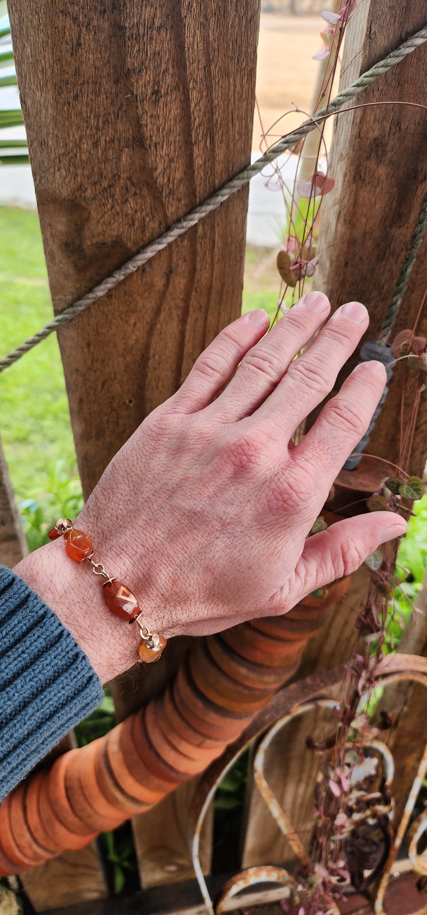 Exquisite Antique Victorian Era 9ct Rosy /Yellow Gold and Banded Carnelian(Agate) Gemstone beaded bracelet with safety chain .
The beads hand wrapped with 9ct Rosy/Yellow Gold wire and accented with 9ct Rose Gold discks at each end of the beads.