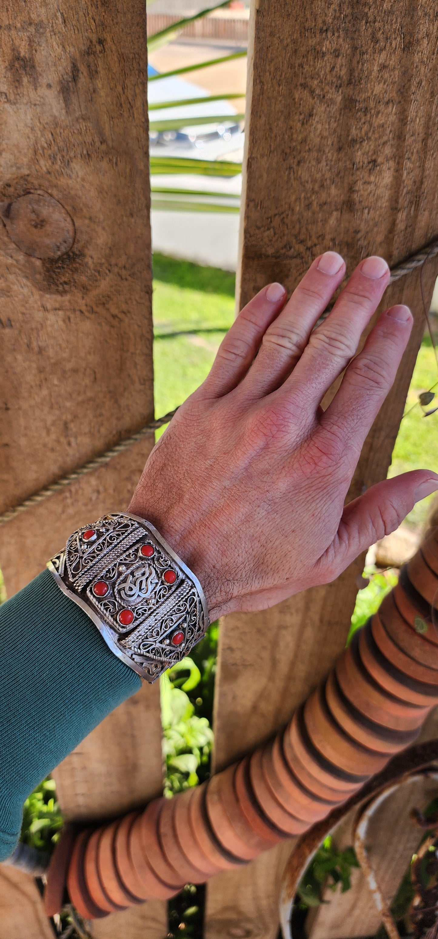 Antique Sterling Silver Ethnic/Tribal Middle Eastern "Berber" bracelet with richly chiseled decorations and Calligraphy , set with 6x Red Coral Cabochons .