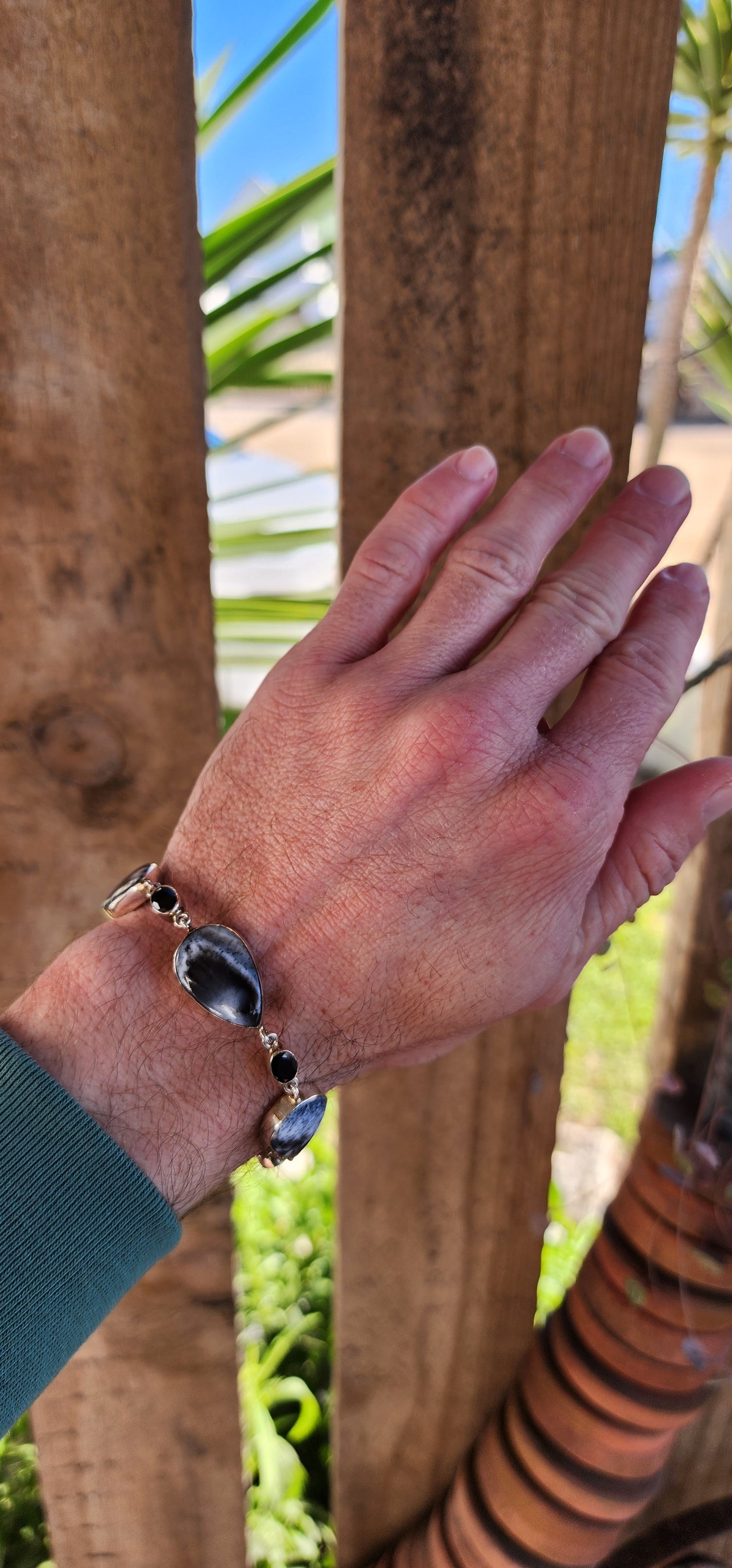 Attractive Sterling Silver dress bracelet - Bezel/Tube set with 4x beautiful Pear Cut Dendritic Agate Cabochons and 3x Black Oval Cut Onyx Gemstones.