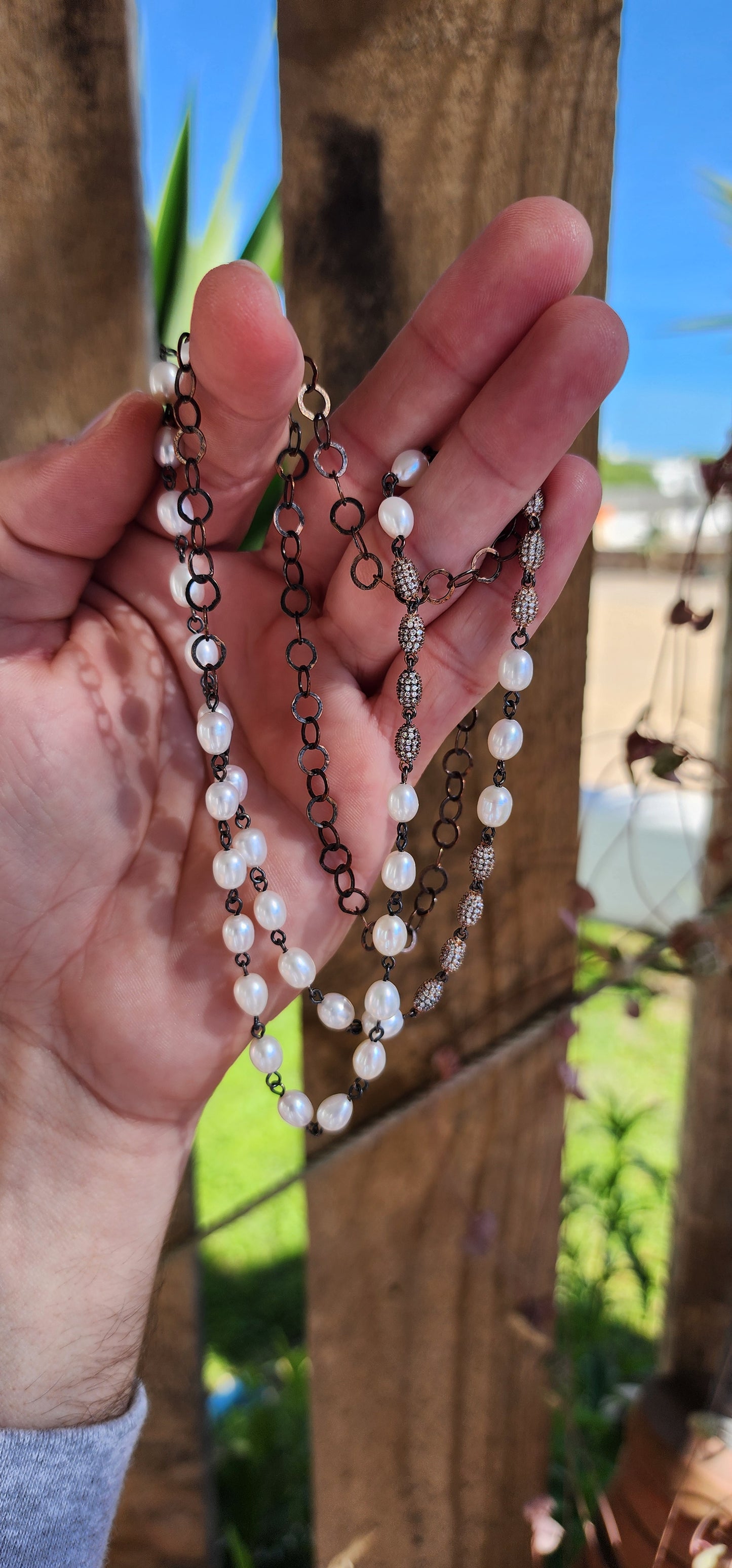 The perfect stacking companion! Lovely extra length artisan made necklace - Crafted in Rosy/Antiqued plating over Sterling Silver with handwrapped Freshwater Pearl beads and accented with Rose Gold plated over Sterling and Pavé set CZ Gemstones beads.