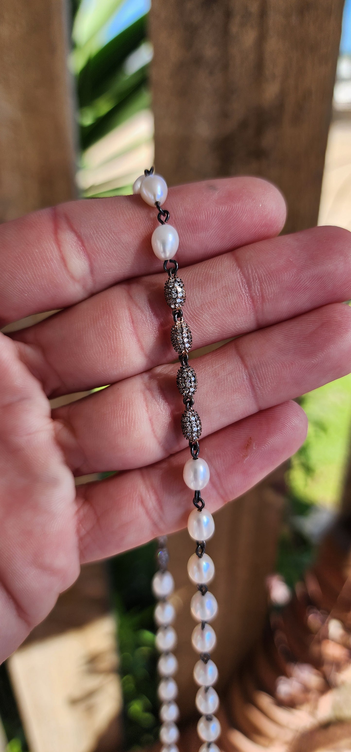 The perfect stacking companion! Lovely extra length artisan made necklace - Crafted in Rosy/Antiqued plating over Sterling Silver with handwrapped Freshwater Pearl beads and accented with Rose Gold plated over Sterling and Pavé set CZ Gemstones beads.