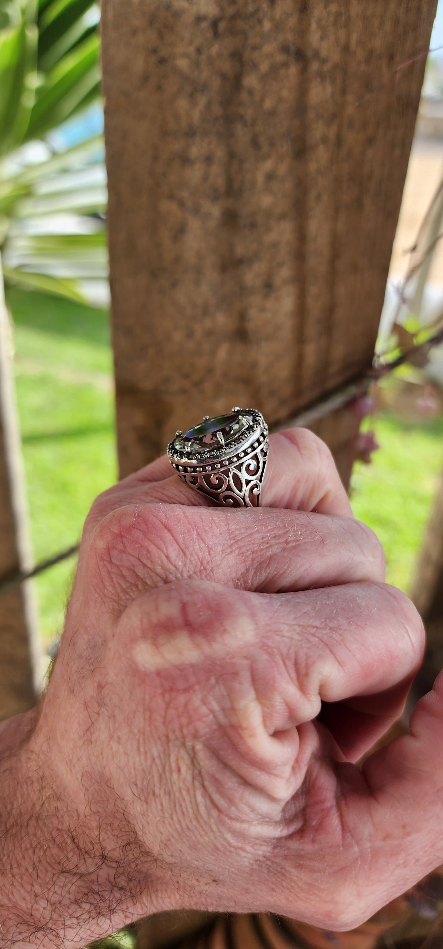 Exquisite and chunky Sterling Silver Cocktail/Dress ring featuring an lovely claw-set light Green Oval Cut Prasiolite Gemstone in an sparkly Marcasite Haló border.