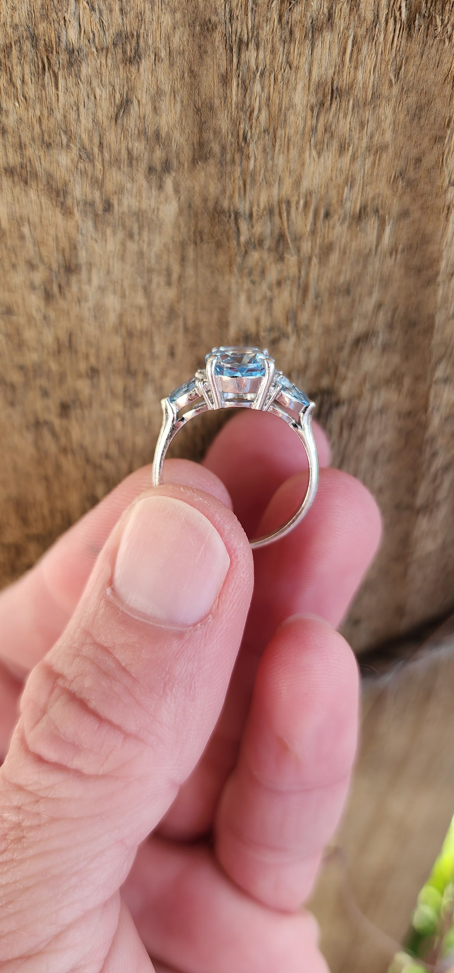 Really beautiful Sterling Silver and Sky Blue Topaz Trilogy ring - Claw set with an centre Oval Cut Topaz Gemstones and flanked by two claw set Pear cut Topaz Gemstones.