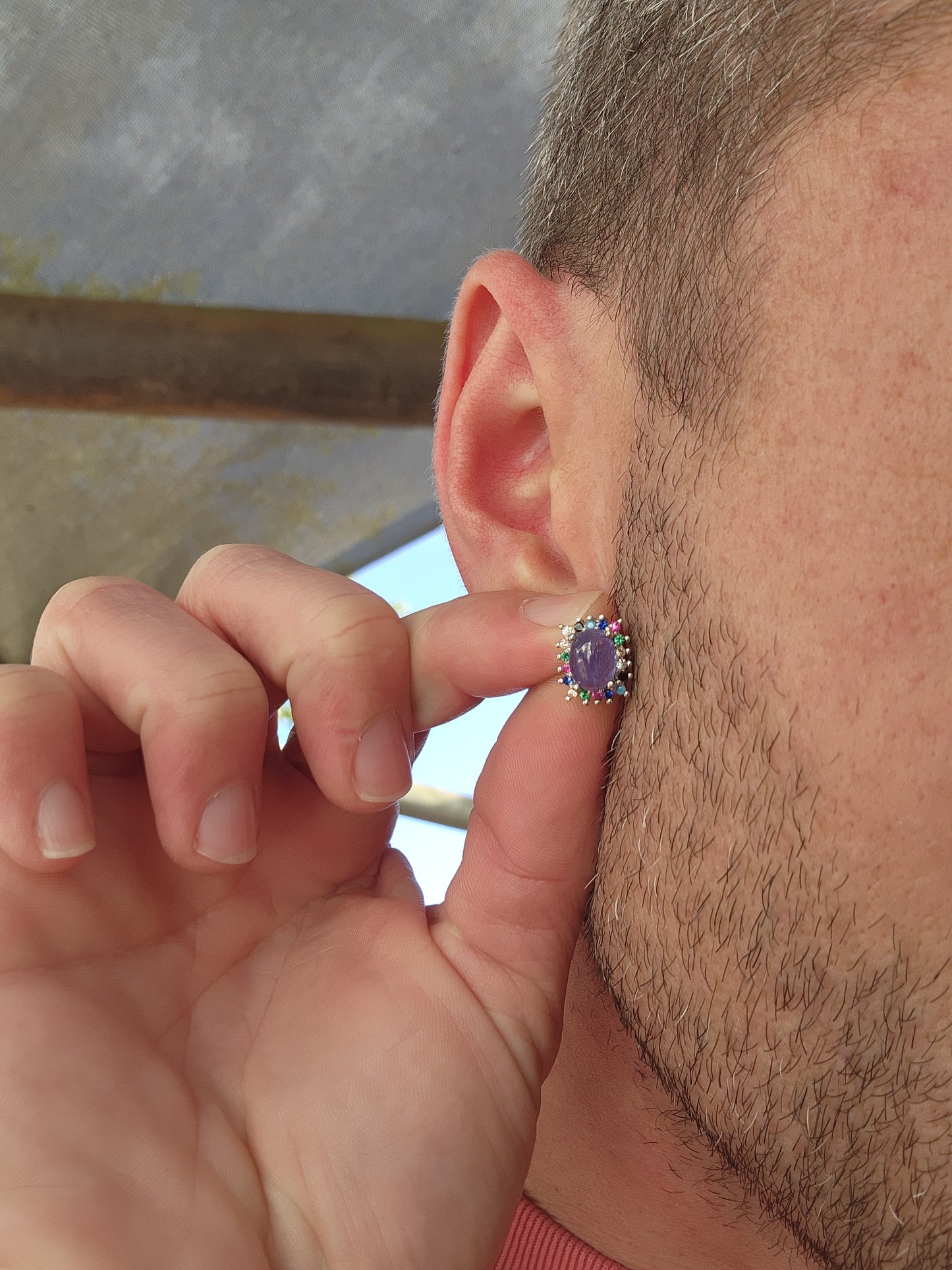 Extremely beautiful and elegant pair of Sterling Silver stud earrings - Each Earring claw set with an Natural Tanzanite Cabochon in the centre and surrounded by an muticolor Gemstones Haló frame.