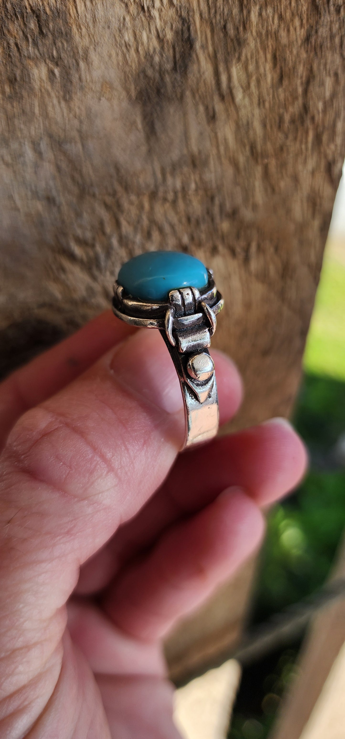 Increbidly beautiful Sterling Silver Artisan made unisex ring , featuring the most beautiful Robins Egg Blue Turquoise Cabochon , claw set in an raised basket with highly ornate shoulders