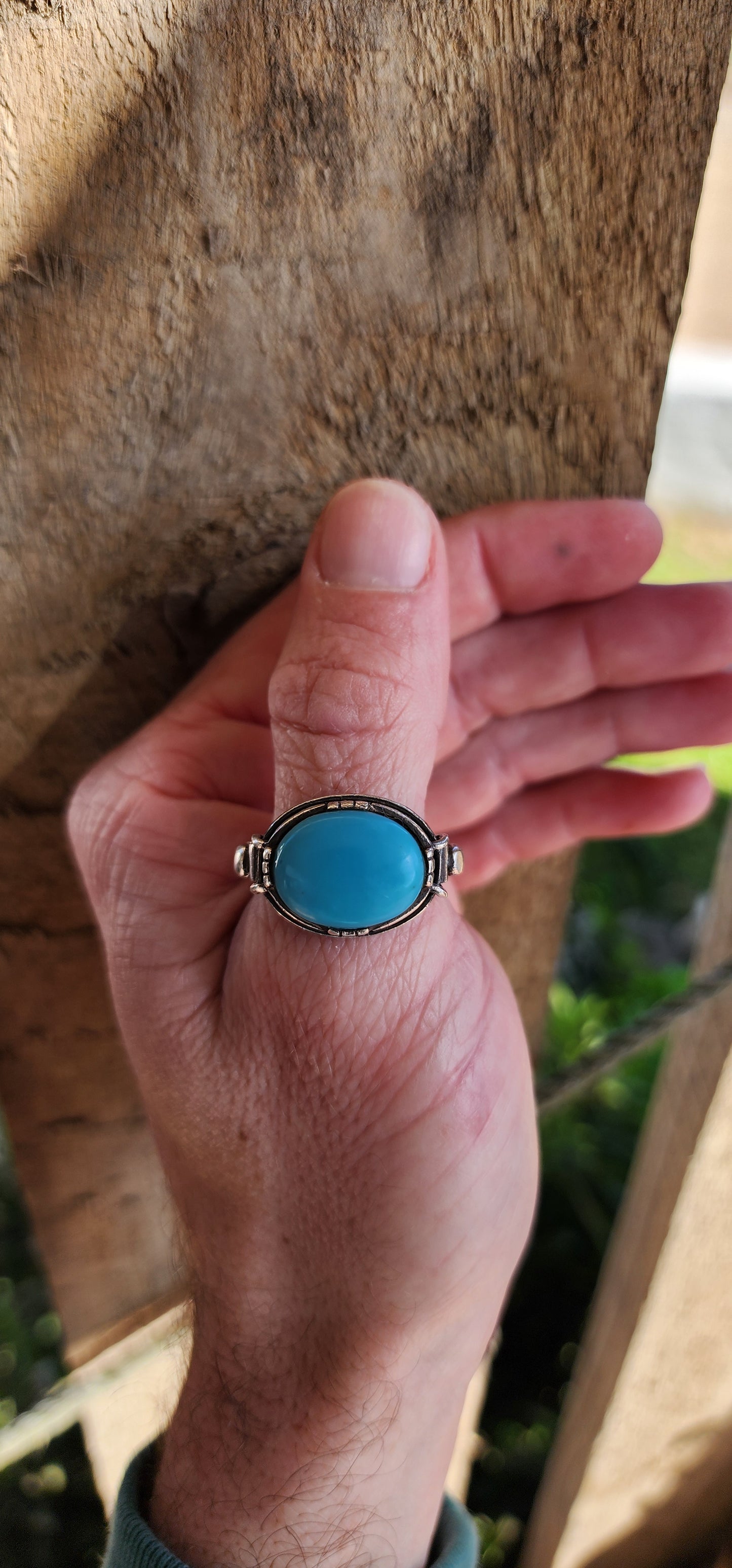 Increbidly beautiful Sterling Silver Artisan made unisex ring , featuring the most beautiful Robins Egg Blue Turquoise Cabochon , claw set in an raised basket with highly ornate shoulders